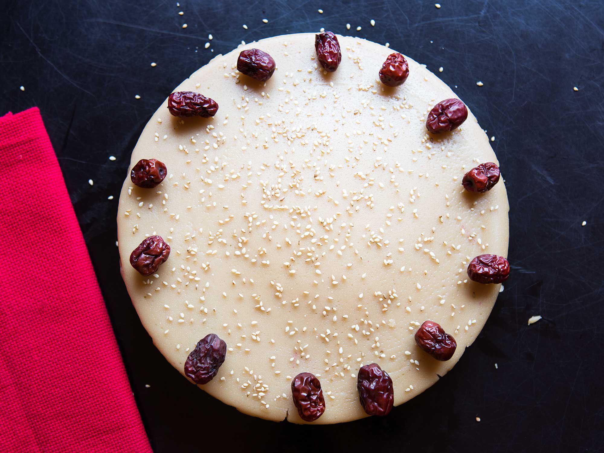 This chewy steamed cake, with flavors of almond and caramel, is traditionally eaten for the Lunar New Year. Eat it warm or let the cake cool completely, then cut into slabs, batter with beaten egg, and fry them until crisp. <a href="https://www.saveur.com/sticky-rice-almond-cake-nian-gao-recipe/">Get the recipe for Sticky Rice and Almond Cake (Nian Gao)</a>