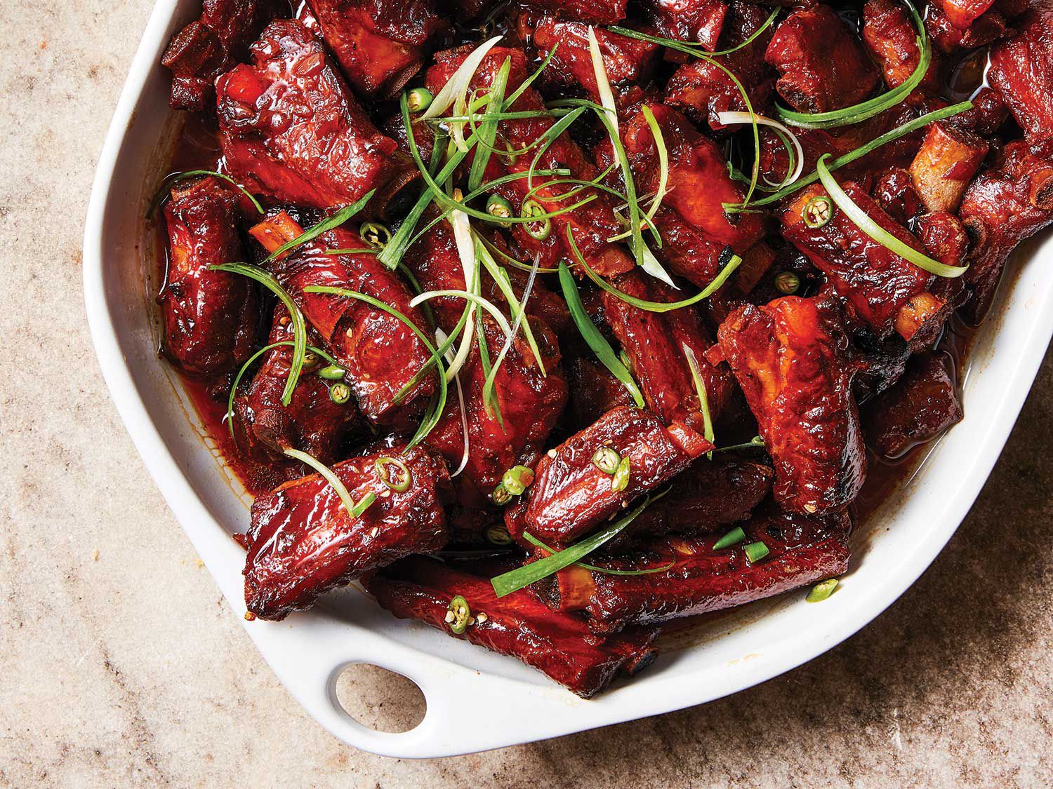Originally from rural northern Vietnam, this dish was traditionally cooked in a clay pot. <a href=”https://www.saveur.com/article/Recipes/Pork-Riblets-Simmered-in-Caramel-Sauce/”>Get the recipe for Pork Riblets Simmered in Caramel Sauce</a>