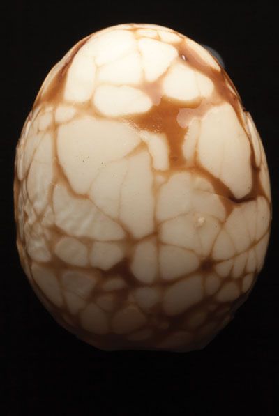 Cooked in a flavorful marinade of soy sauce, star anise, and cinnamon, these tea-stained eggs are a Lunar New Year staple and a favorite everyday snack in China. <a href="https://www.saveur.com/article/Recipes/chinese-tea-eggs/">Get the recipe for Chinese Tea Eggs</a>