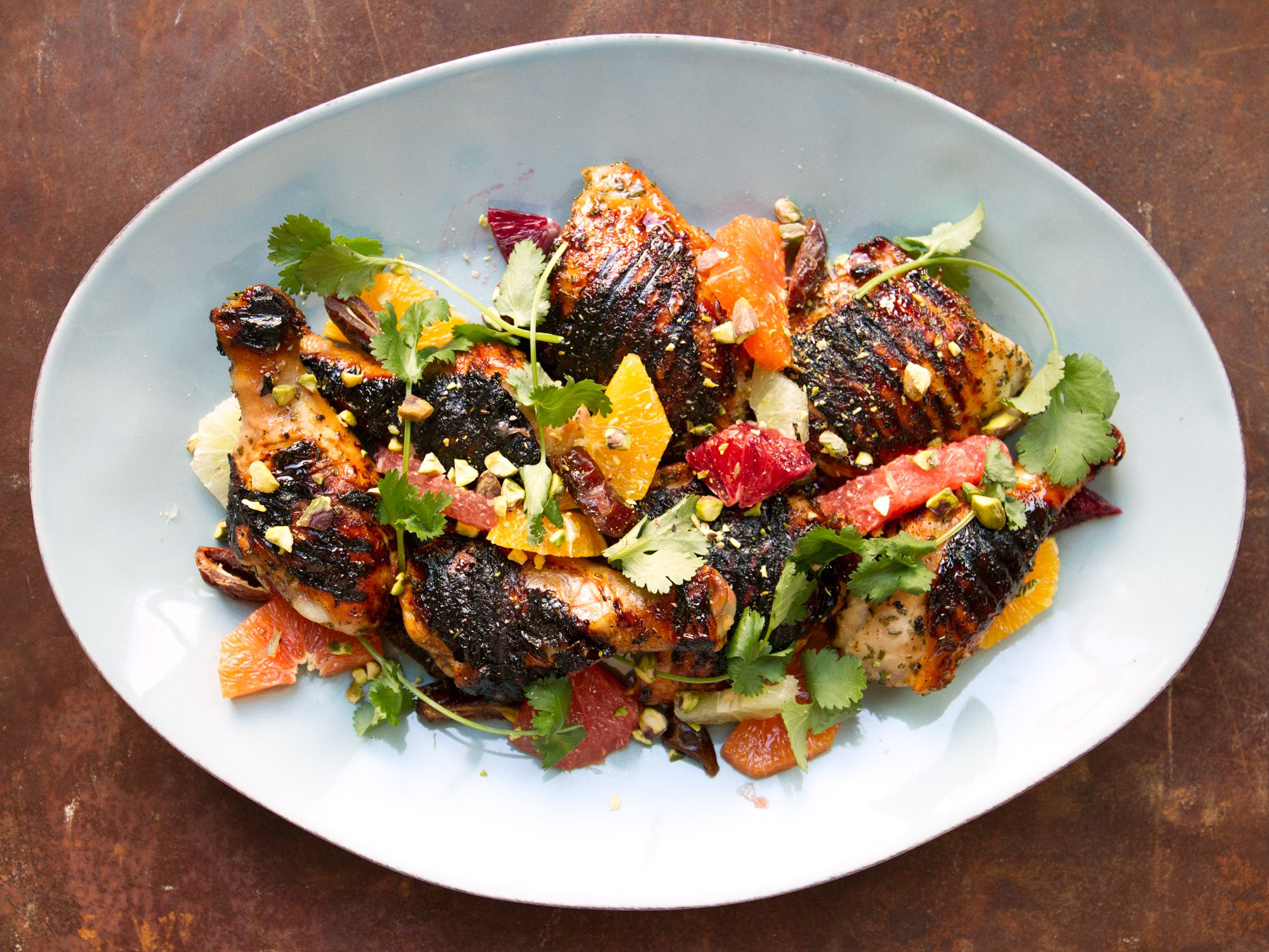 This grilled chicken dish is the Holy Trinity of weeknight cooking: delicious, quick, and made from easy-to-find ingredients. <a href="https://www.saveur.com/article/recipes/honey-grilled-chicken-with-citrus-salad">Get the recipe for Honey-Grilled Chicken with Citrus Salad</a>