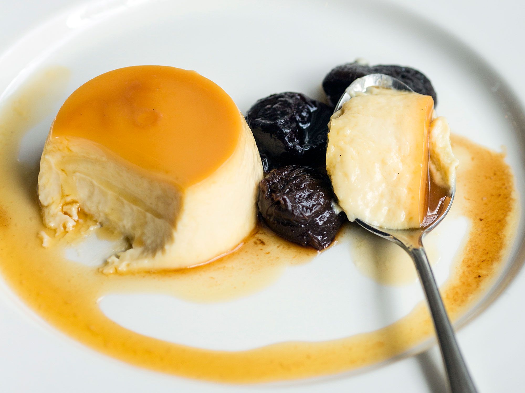 At Boulestin, Agen prunes, prized for their caramel notes and soft texture, are infused with brewed tea, cinnamon, and armagnac and then used to top this sumptuous custard. In lieu of vanilla sugar, you can substitute 3/4 cup sugar and 1 tsp. vanilla extract. Get the recipe for <a href="http://www.saveur.com/sauternes-creme-caramel-with-armagnac-soaked-prunes-recipe">Sauternes Custard with Armagnac-Soaked Prunes</a>