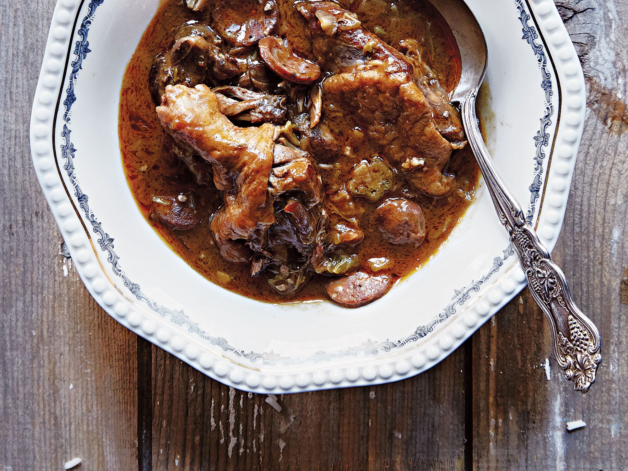 This stew uses rendered duck fat in the roux instead of butter and quartered ducks in lieu of the classic chicken. <a href="https://www.saveur.com/duck-leg-and-andouille-sausage-gumbo-recipe">Get the recipe for Duck and Andouille Gumbo</a>