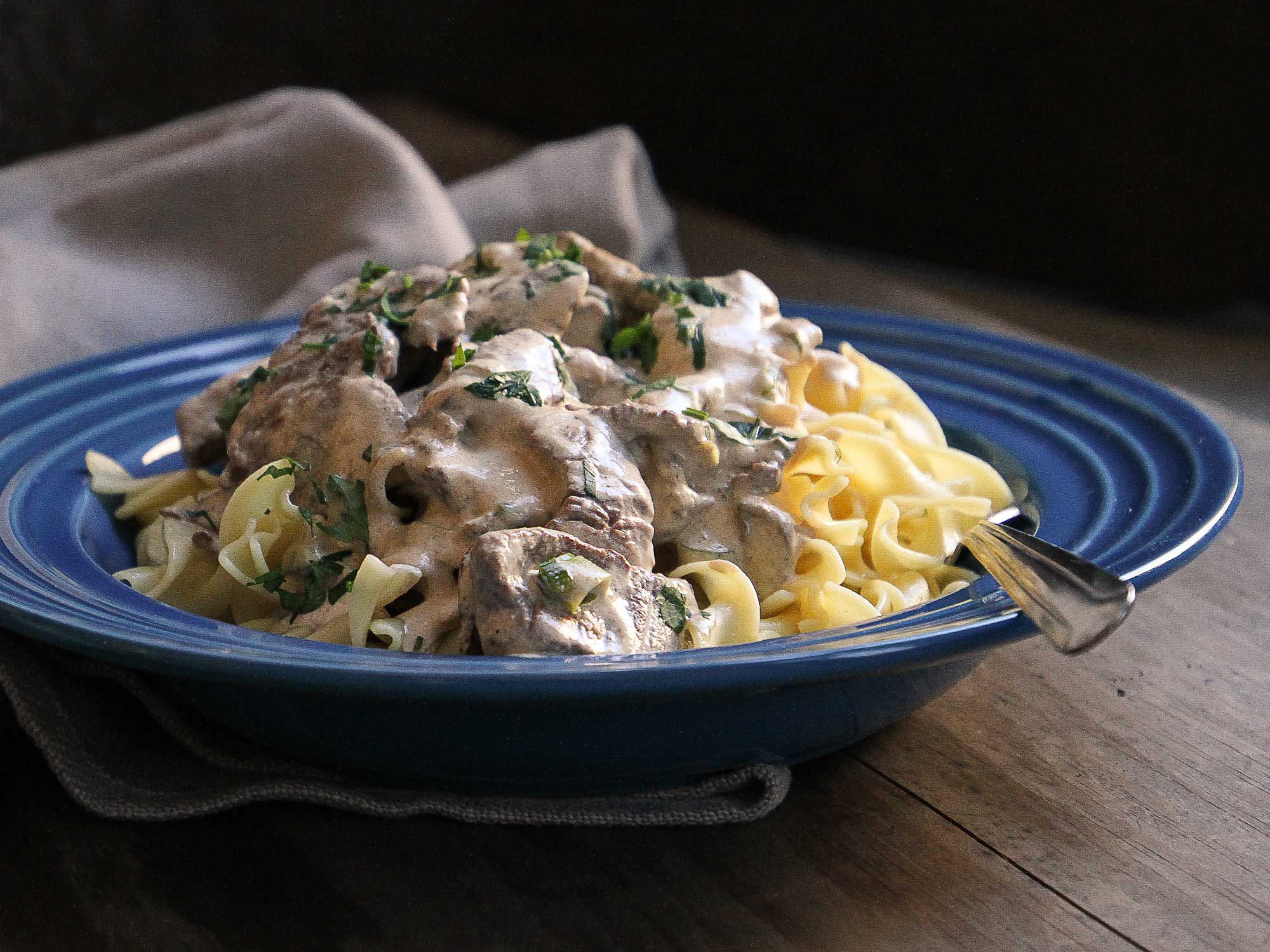One of many timeless recipes featured in American Food Writing is James Beard's take on this comforting noodle dish. Keep it simple. Beard says, "Beware of those that specify long cooking. Beef stroganoff is much better when prepared quickly." <a href="https://www.saveur.com/article/Recipes/James-Beards-Beef-Stroganoff">Get the recipe for James Beard's Beef Stroganoff</a>