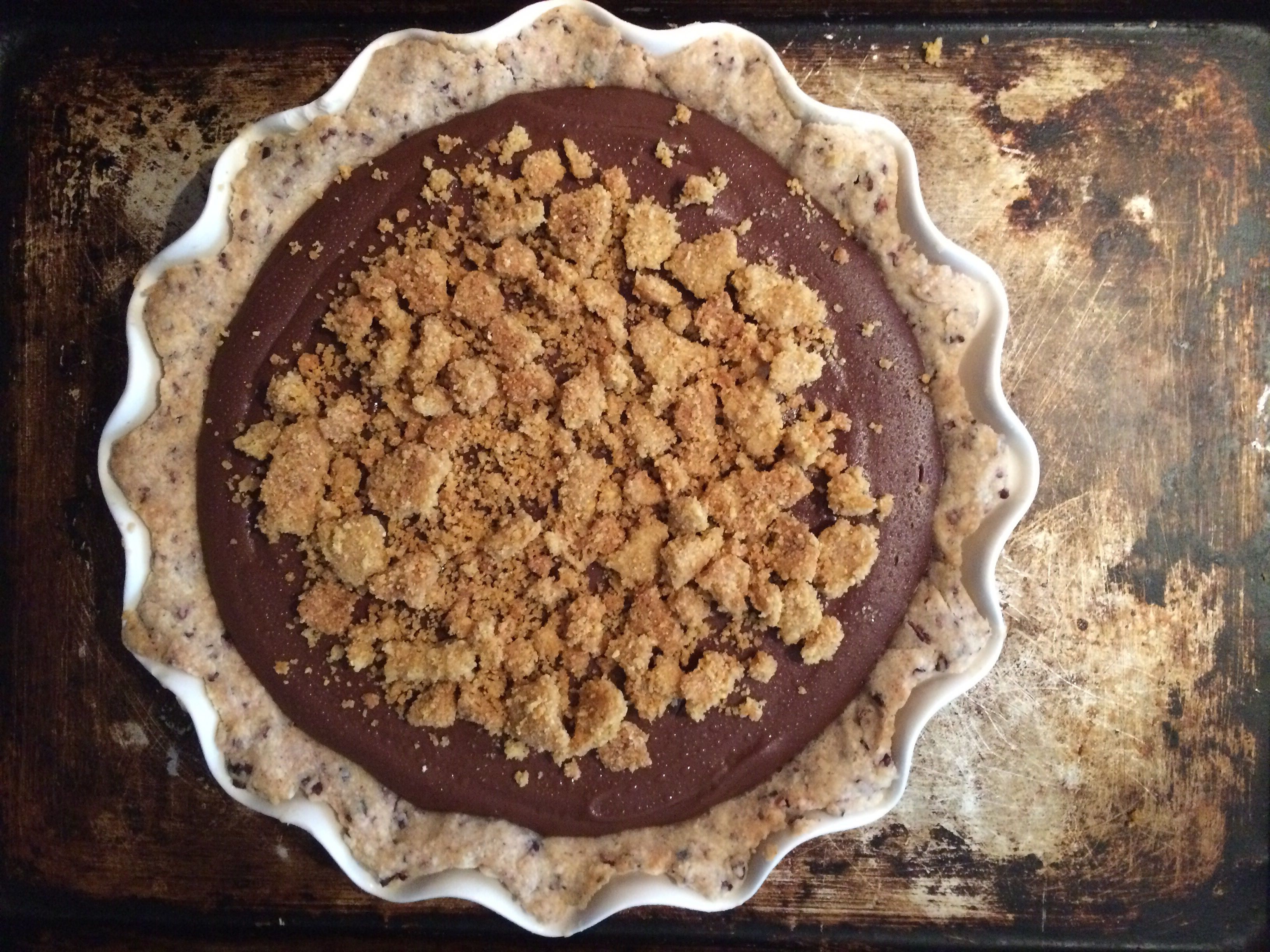 Chef Scott Crawford of the forthcoming Standard Foods in Raleigh updates the simple Southern custard pie by adding cacao nibs to the butter crust and sprinkling a nutty cornbread crumble on top. Get the recipe for <a href="https://www.saveur.com/chocolate-chess-pie-cornbread-crumble-recipe">Chocolate Chess Pie</a>