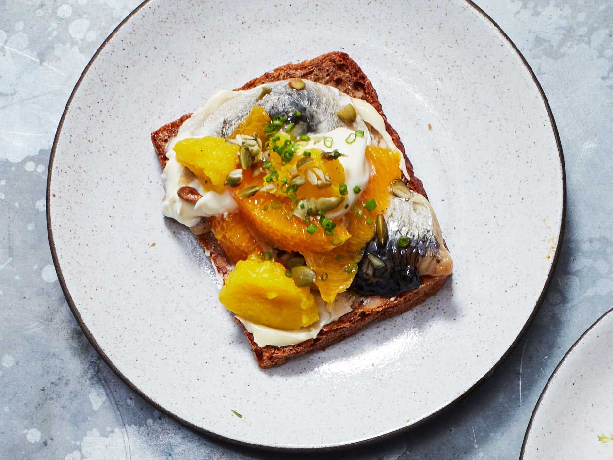 Danes reach for small shrimp, boiled eggs, and herring (pickled or fermented)—all ingredients that are common to the region. Slotskaelderen Hos Gitte Kik, one of Copenhagen's oldest smørrebrød restaurants, offers eight different herring options. Aamann's more modern smørrebrød menu includes plenty of local produce, too. "We have beautiful fruit like plums, and the best apples," he says. He also uses beets, fennel, asparagus, and cherries when in season. Get the recipe for <a href="https://www.saveur.com/pickled-herring-orange-creme-fraiche-smorrebrod-recipe/">Pickled Herring, Orange, and Crème Fraiche Smørrebrød</a>