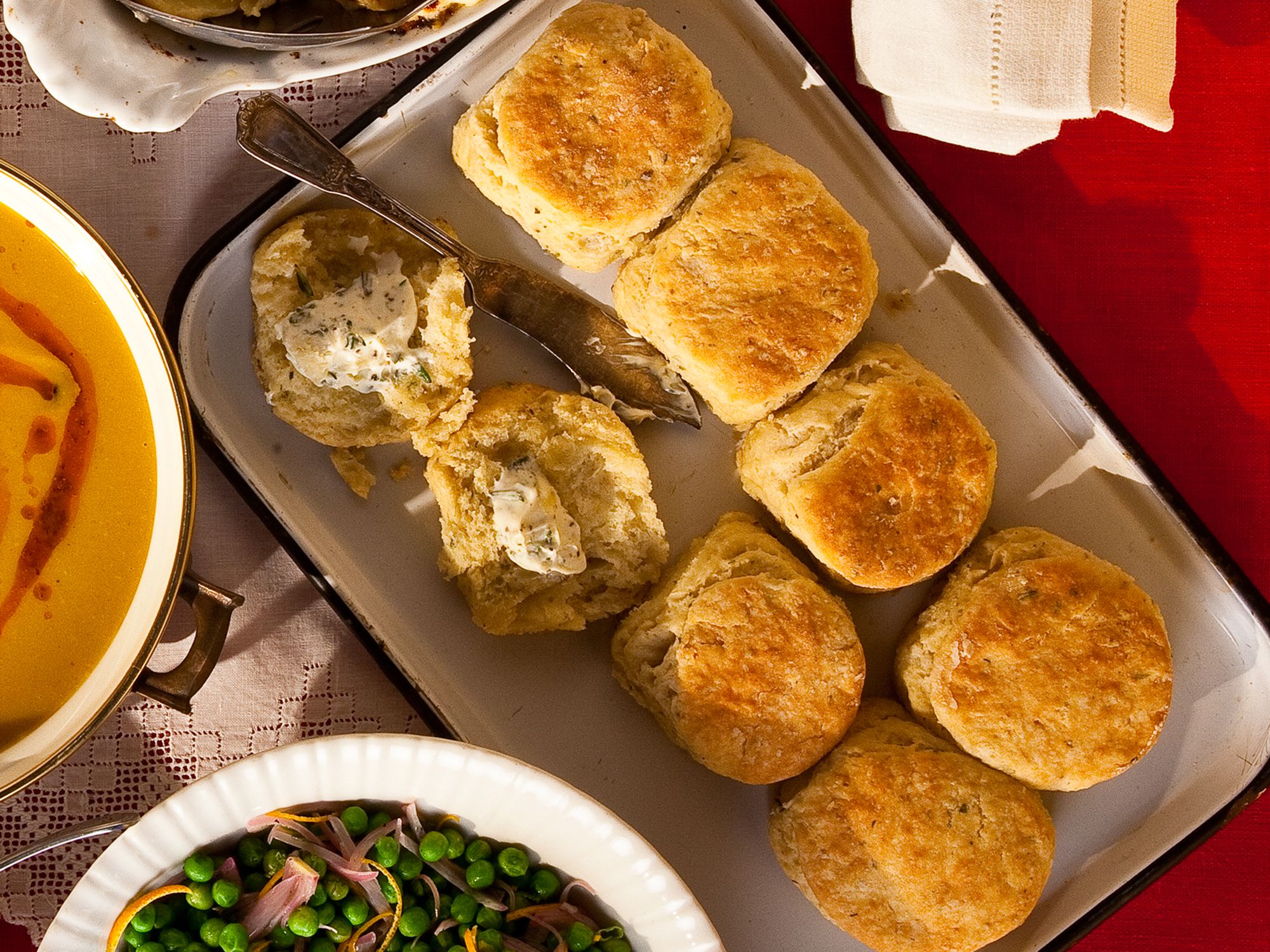 Instead of plain dinner rolls, we like to serve these fluffy biscuits, fragrant with rosemary and thyme. Get the recipe for <a href="https://www.saveur.com/article/Recipes/Honey-and-Herb-Biscuits/">Honey and Herb Biscuits</a>