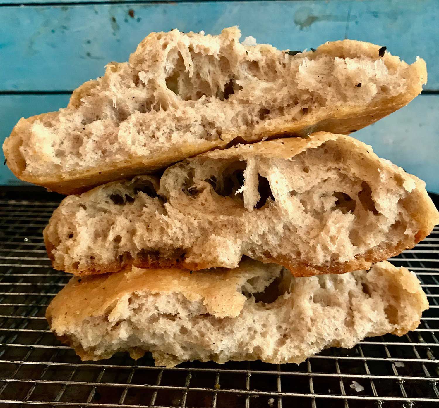 Chef Jeffrey Weiss's rustic olive oil bread with sourdough, rye, and herbs. Get the recipe for <a href="https://www.saveur.com/spanish-olive-oil-bread-recipe/">Spanish Olive Oil Bread (Pan de Aceite)</a>