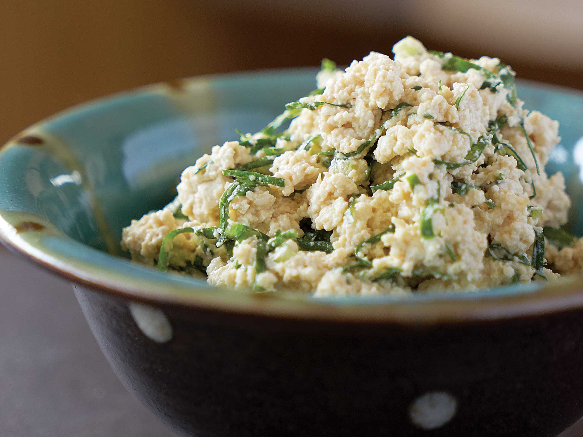 Tofu adds creaminess to this spare salad of spinach dressed with peanut butter and red miso paste. Get the recipe for <a href="http://www.saveur.com/spinach-and-tofu-salad-with-peanut-miso-dressing-recipe">Spinach and Tofu Salad with Peanut–Miso Dressing</a>