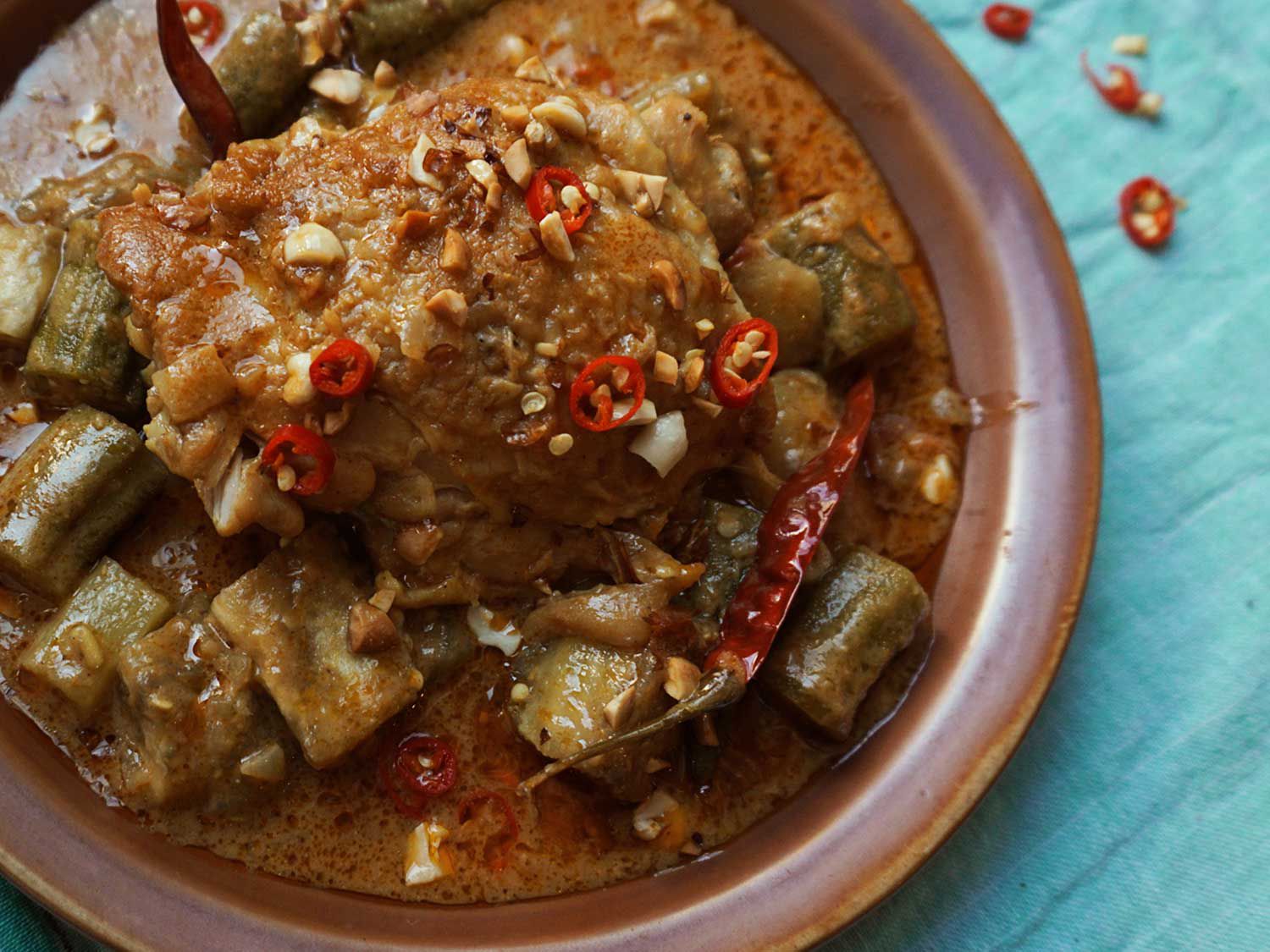 Okra, tomatoes, hot chiles, and plum tomatoes lighten the stew's intense richness, but it's the indispensable peanut that gives this dish its essential earthy character. Get the recipe for <a href="https://www.saveur.com/article/Recipes/Classic-West-African-Peanut-Stew/">West African Peanut Stew</a>