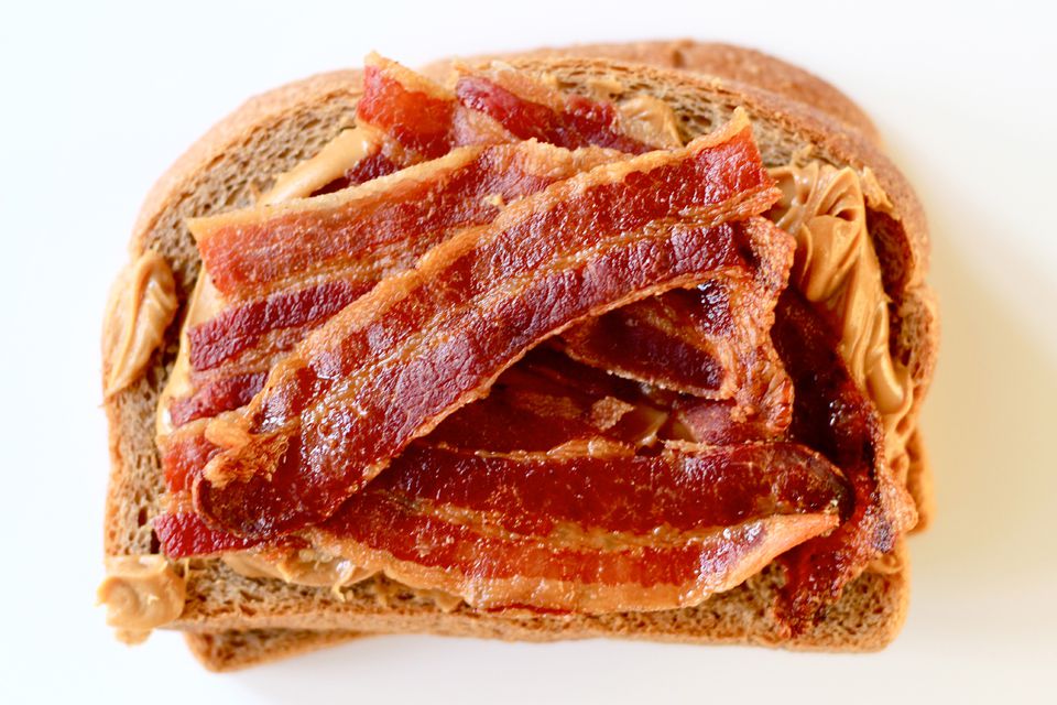 Bring out peanut butter's savory side by topping it with a few strips of smoky bacon—cooked extra-crisp to hold up against sogginess. On hearty whole-wheat bread, it's the kind of sandwich you may not be able to wait until lunchtime to eat. Get the recipe for <a href="https://www.saveur.com/article/Recipes/Peanut-Butter-and-Bacon-Sandwich/">Peanut Butter and Bacon Sandwich</a>