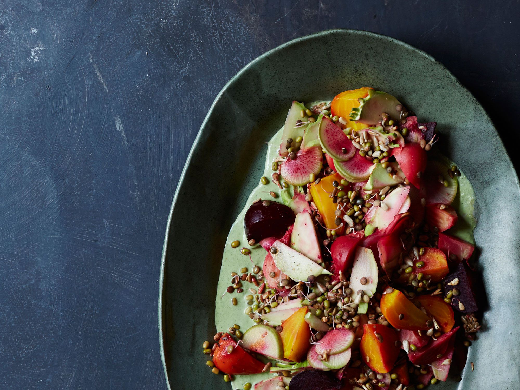 Sprouted lentils, mung beans, and sunflower seeds add lightness and nutrient density to a hearty salad of beets and kohlrabi over an herbed dressing. Get the recipe for <a href="http://www.saveur.com/bean-sprout-beet-salad-creme-fraiche-dressing-recipe">Sprouts, Kohlrabi, and Beet Salad with Herbed Crème Fraîche Dressing</a>