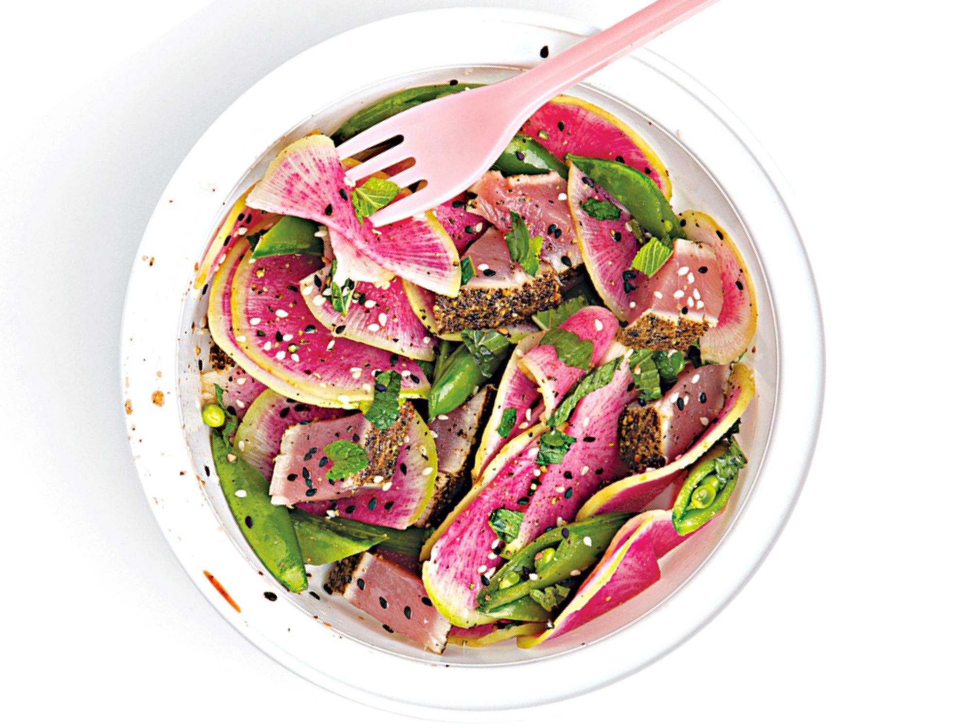 At Los Angeles' Lemonade restaurant, crunchy radishes, snap peas, and medium-rare seared tuna are tossed in a ginger-soy dressing for a crisp and colorful entrée salad. Get the recipe for <a href="https://www.saveur.com/article/recipes/watermelon-radish-ahi-tuna-and-snap-pea-salad/">Watermelon Radish, Ahi Tuna, and Snap Pea Salad</a>