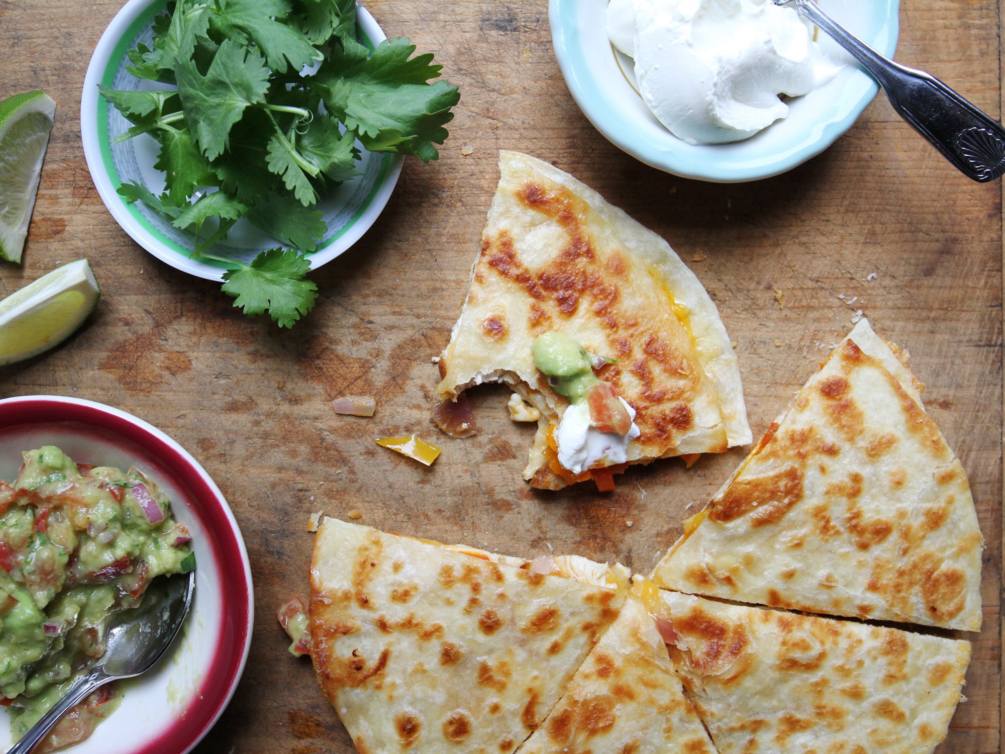 A homemade Mexican spice rub adds a gentle heat to the chicken and peppers in this uncomplicated dish. Get the recipe for <a href="https://www.saveur.com/chicken-quesadilla-recipe">Chicken Quesadillas</a>