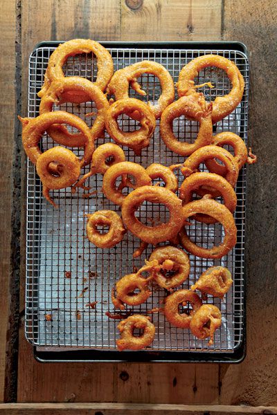 A flavorful batter infused with honey, paprika, and lager beer is the secret to these crunchy onion rings. Get the recipe for <a href="https://www.saveur.com/article/Recipes/Beer-Battered-Onion-Rings">Beer-Battered Onion Rings</a>