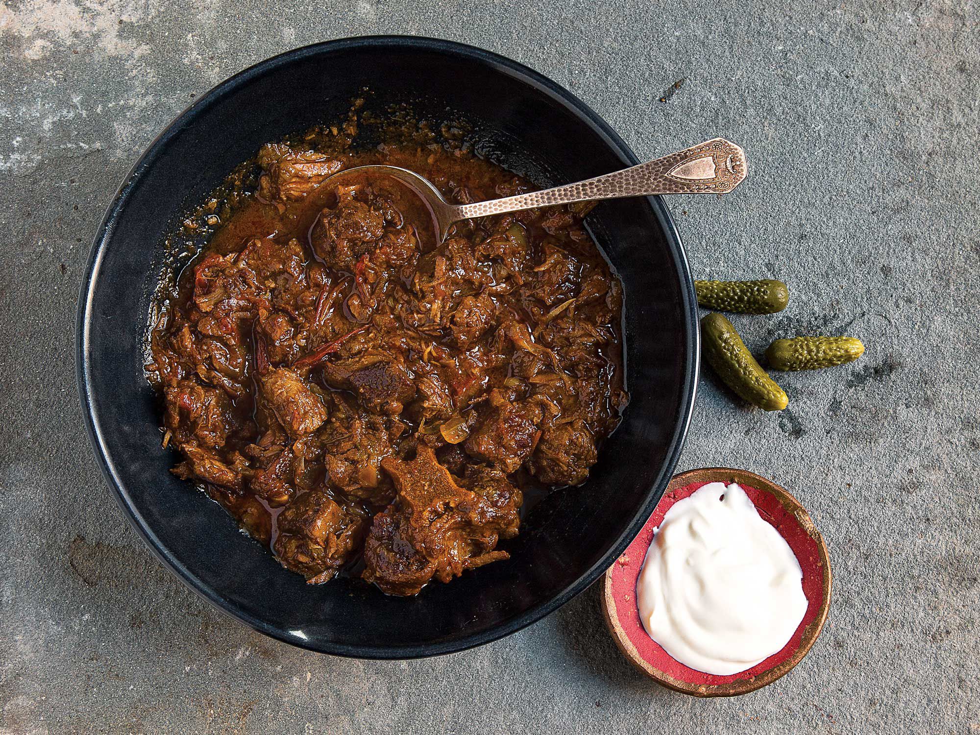 Known everywhere—except in Hungary—as goulash, this stew is made with a generous amount of paprika and cook down until the meat is fork-tender. Get the recipe for <a href="https://www.saveur.com/hungarian-braised-beef-with-paprika-porkolt-recipe/">Hungarian Braised Beef with Paprika (Pörkölt)</a>