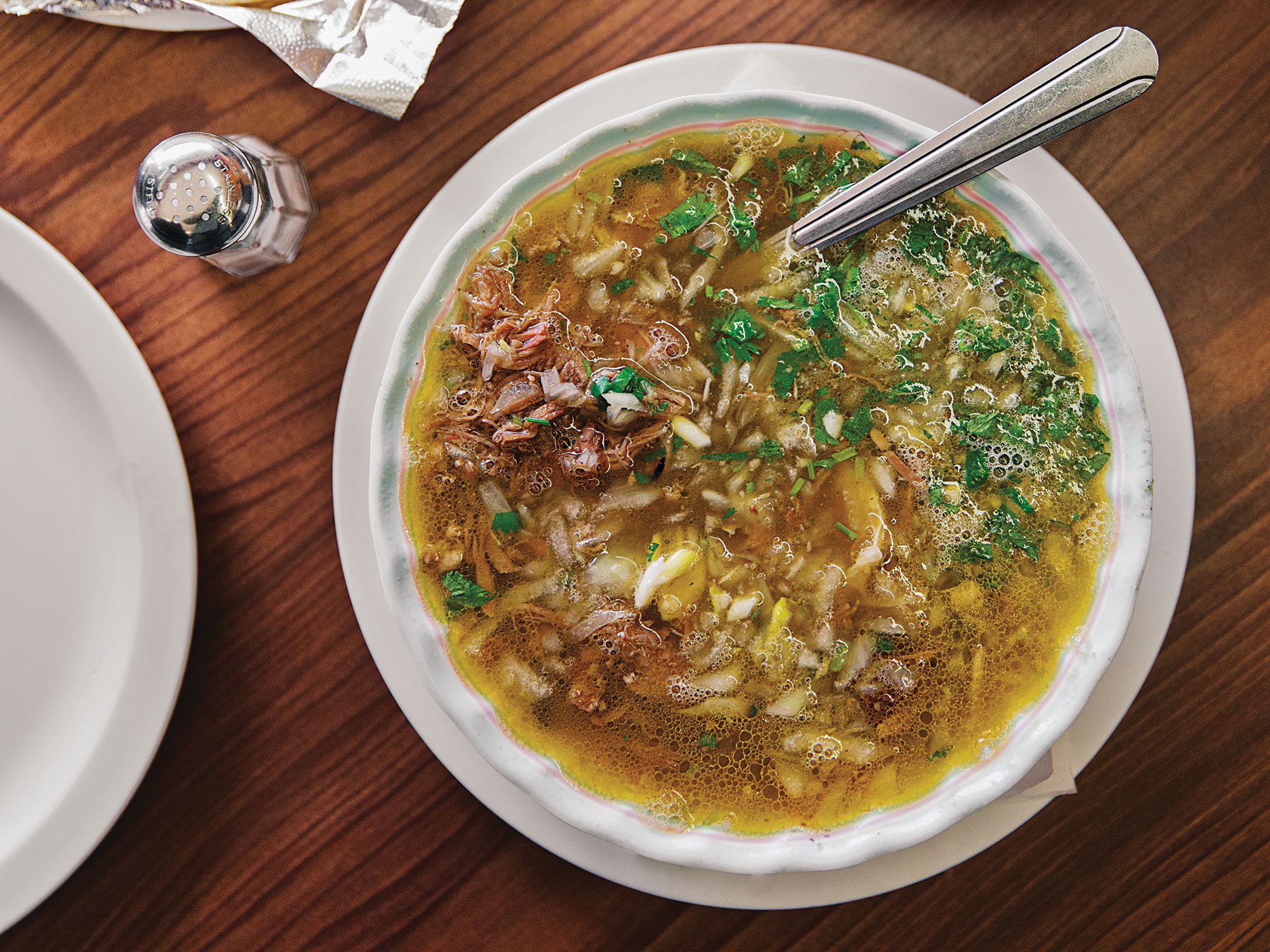 A low-and-slow cooking technique used for this birria, which colloquially means "a mess," ensures that the meat is fork-tender and the tomatillo broth infused with a rich, meaty flavor. Swap pork for goat, if you prefer. Get the recipe for <a href="https://www.saveur.com/article/recipes/goat-birria-jalisco-style-goat-stew">Jalisco-Style Goat Stew (Goat Birria)</a>