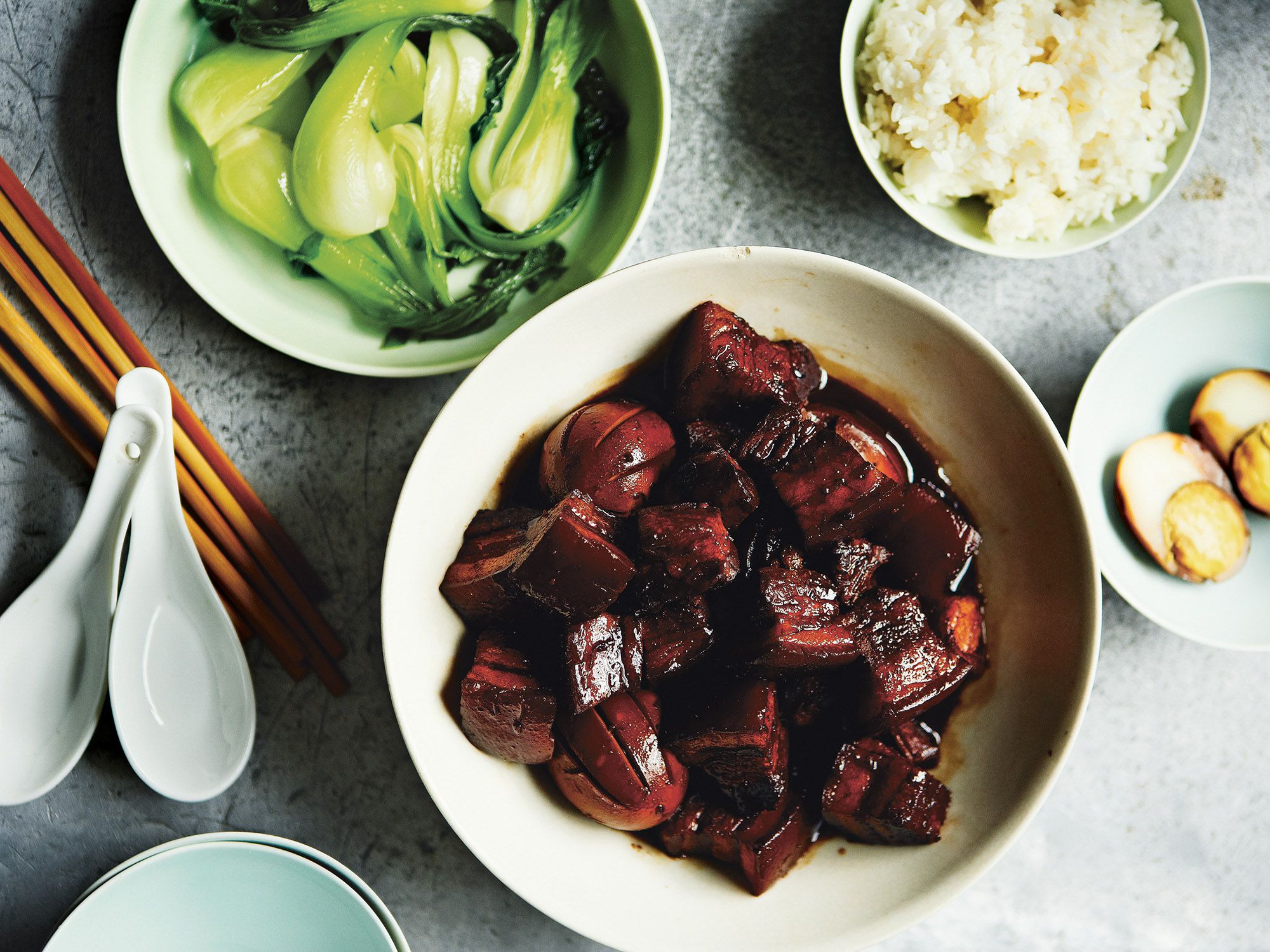 Two types of soy sauce and a touch of sugar give this dish—beloved throughout China—its signature glossiness and a deep red-brown tint. Serve the tender pork belly morsels and boiled eggs with a light vegetable, like bok choy. Get the recipe for <a href="http://www.saveur.com/shanghai-red-braised-pork-with-eggs">Shanghai Red-Braised Pork with Eggs</a>