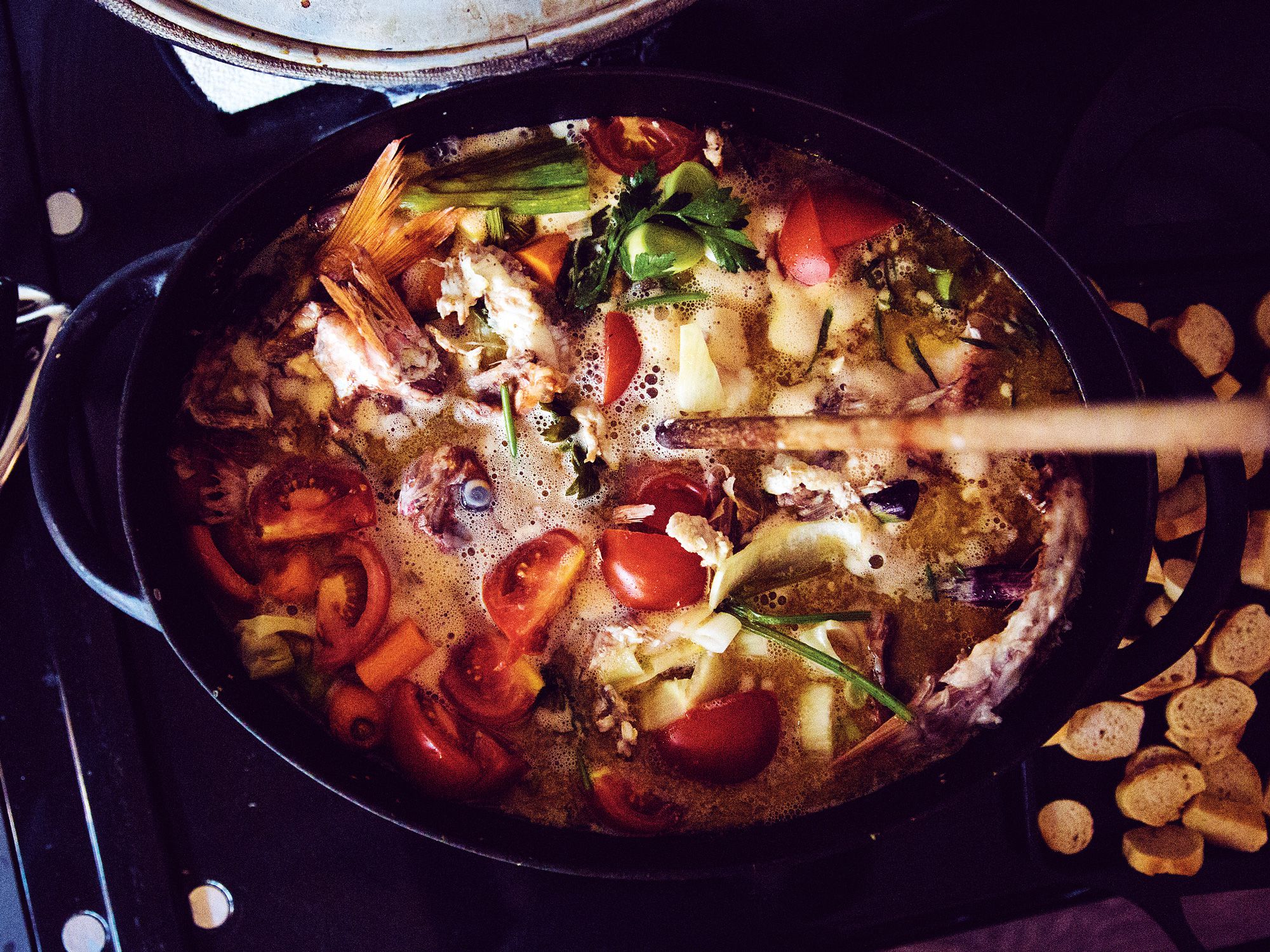 Hearty "bouillabasque"—Darroze's tongue-in-cheek name for a Basque-style bouillabaisse, in which the fish is cooked separately and then added to a rich, reduced seafood-and-tomato stock—perfectly marries the culinary cornerstones of southwest France: duck fat, seafood, and armagnac. You can grill the fish on grates or a plancha, in the Spanish style, but a stovetop solution works just as well. Serve with aïoli, rouille, or any garlicky mayonnaise, along with some crusty bread. Get the recipe for <a href="http://www.saveur.com/basque-seafood-stew-recipe">Basque Seafood Stew</a>