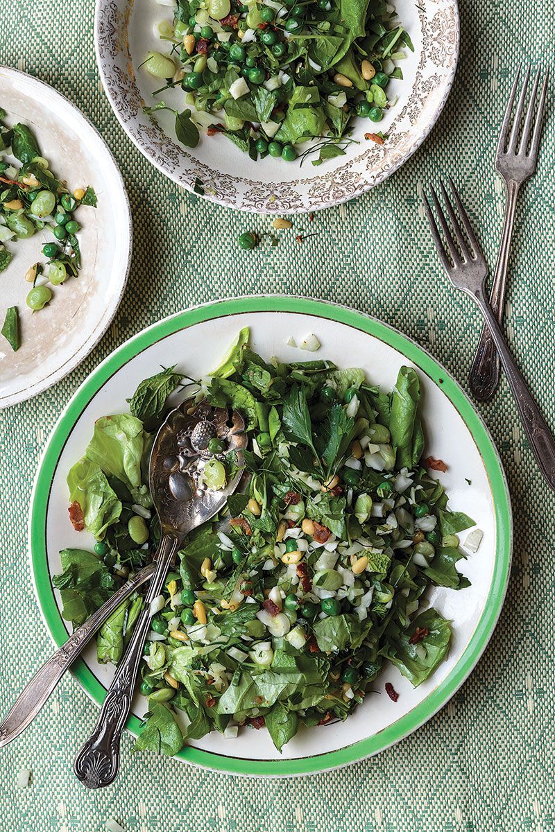Bacon, parmesan, and pine nuts combine with a medley of cooked and raw vegetables to make a satisfying salad from The Canal House's Christopher Hirsheimer. Get the recipe for <a href="https://www.saveur.com/article/recipes/cooked-and-raw-winter-salad/">Cooked and Raw Winter Salad</a>