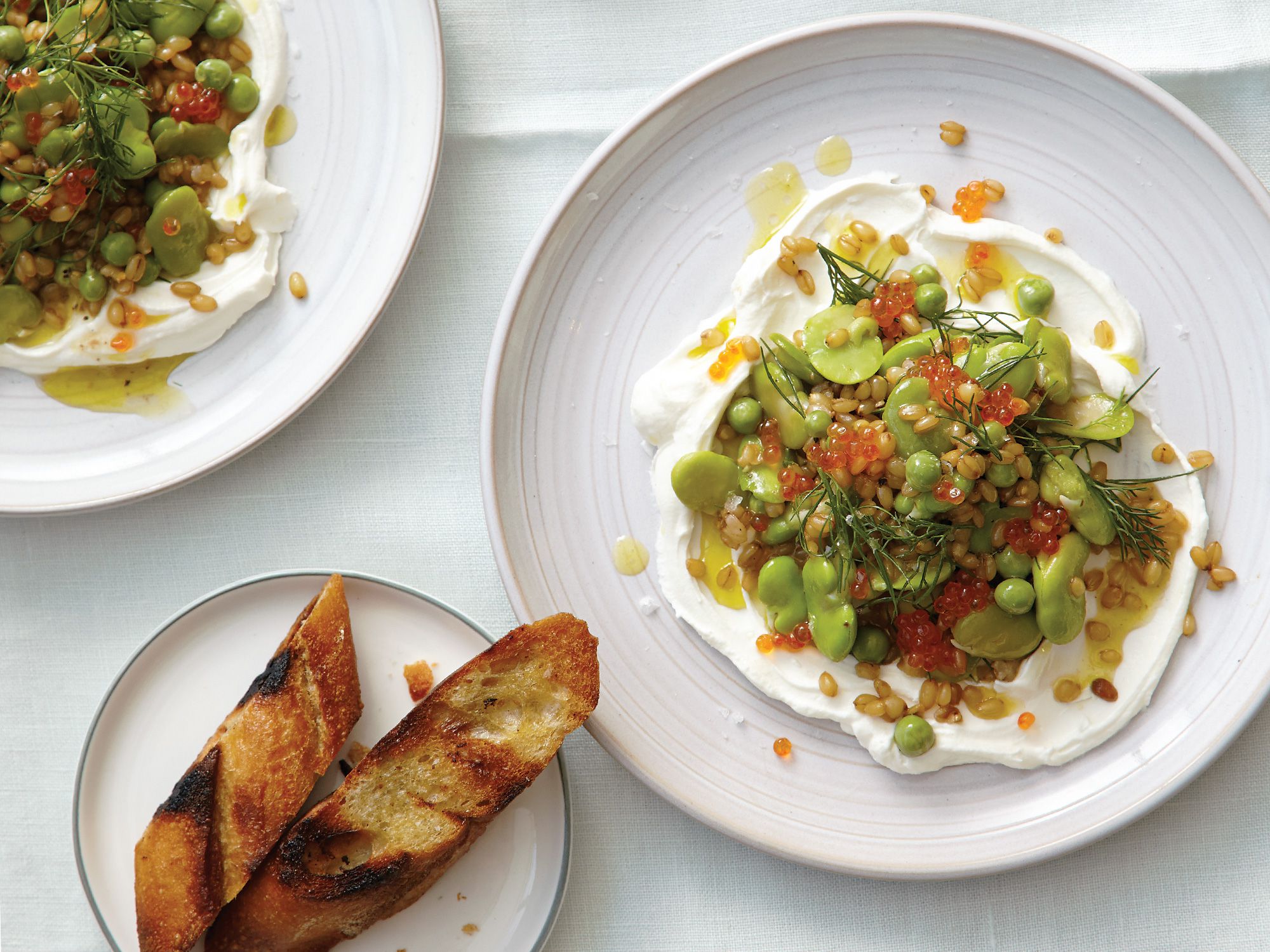 This warm <a href="https://www.saveur.com/article/recipes/warm-wheat-berry-salad-with-fava-beans-and-trout-roe/">Warm Wheat Berry Salad with Fava Beans and Trout Roe</a> is a satisfying main course thanks to chewy, protein-packed wheat berries.