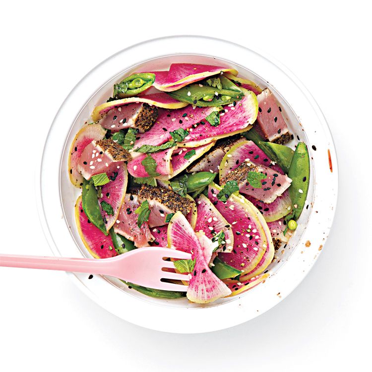 At Los Angeles' Lemonade restaurant, crunchy radishes, snap peas, and medium-rare seared tuna are tossed in a ginger-soy dressing for a crisp and colorful entrée salad. Get the recipe for <a href="https://www.saveur.com/article/recipes/watermelon-radish-ahi-tuna-and-snap-pea-salad">Watermelon Radish, Ahi Tuna, and Snap Pea Salad</a>