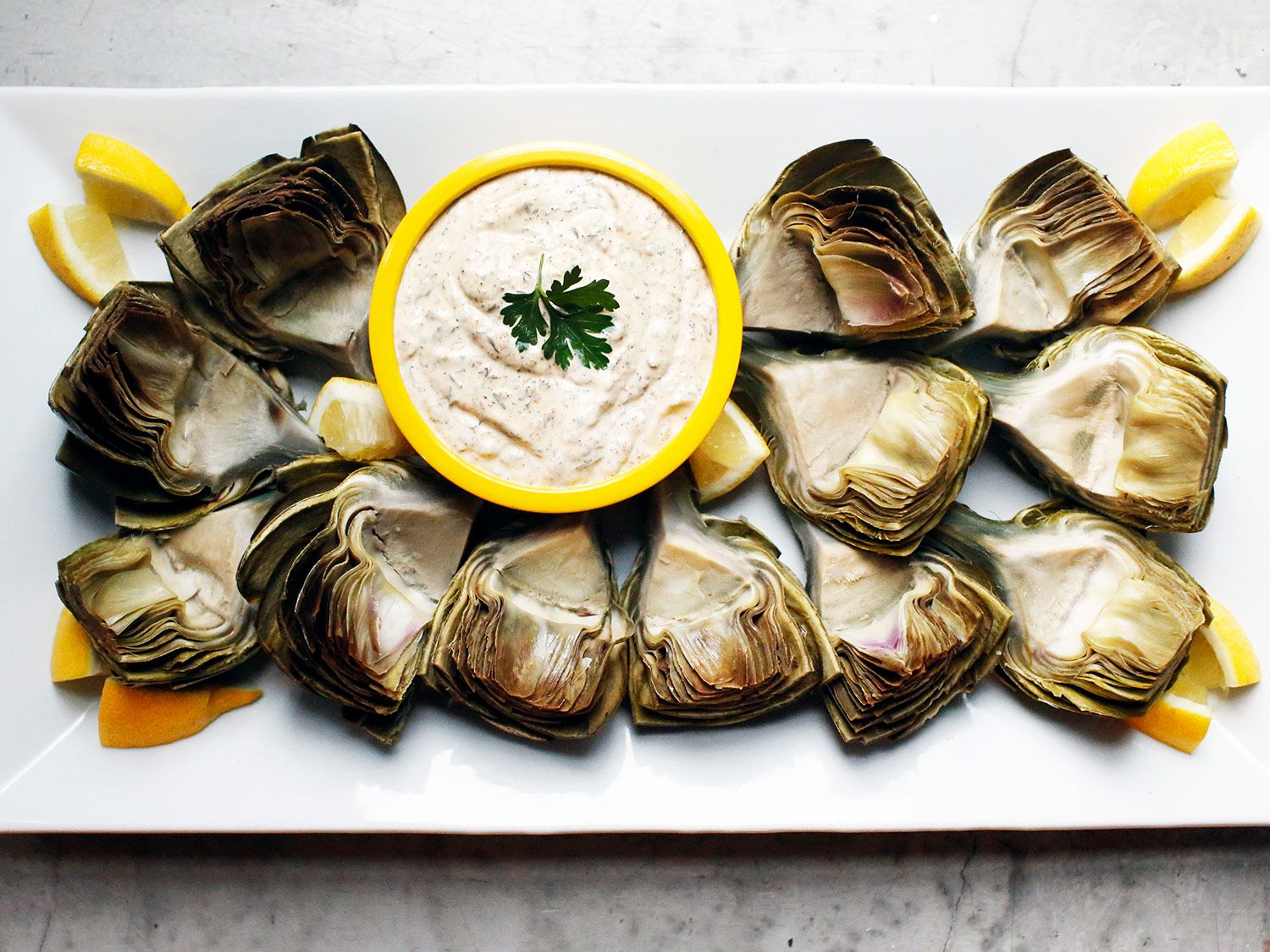 Za'atar is a traditional mixture of sesame seeds, dried thyme, and spices used in Middle Eastern cooking. Added to a mayonnaise base, it makes a perfect dipping sauce for steamed artichokes. This particular version calls for sumac, an African spice that adds a bright lemony flavor to balance out the richness. Get the recipe for <a href="https://www.saveur.com/article/Recipes/Artichokes-with-Lemon-Zaatar-Dipping-Sauce/">Artichokes with Lemon Za'atar Dipping Sauce</a>