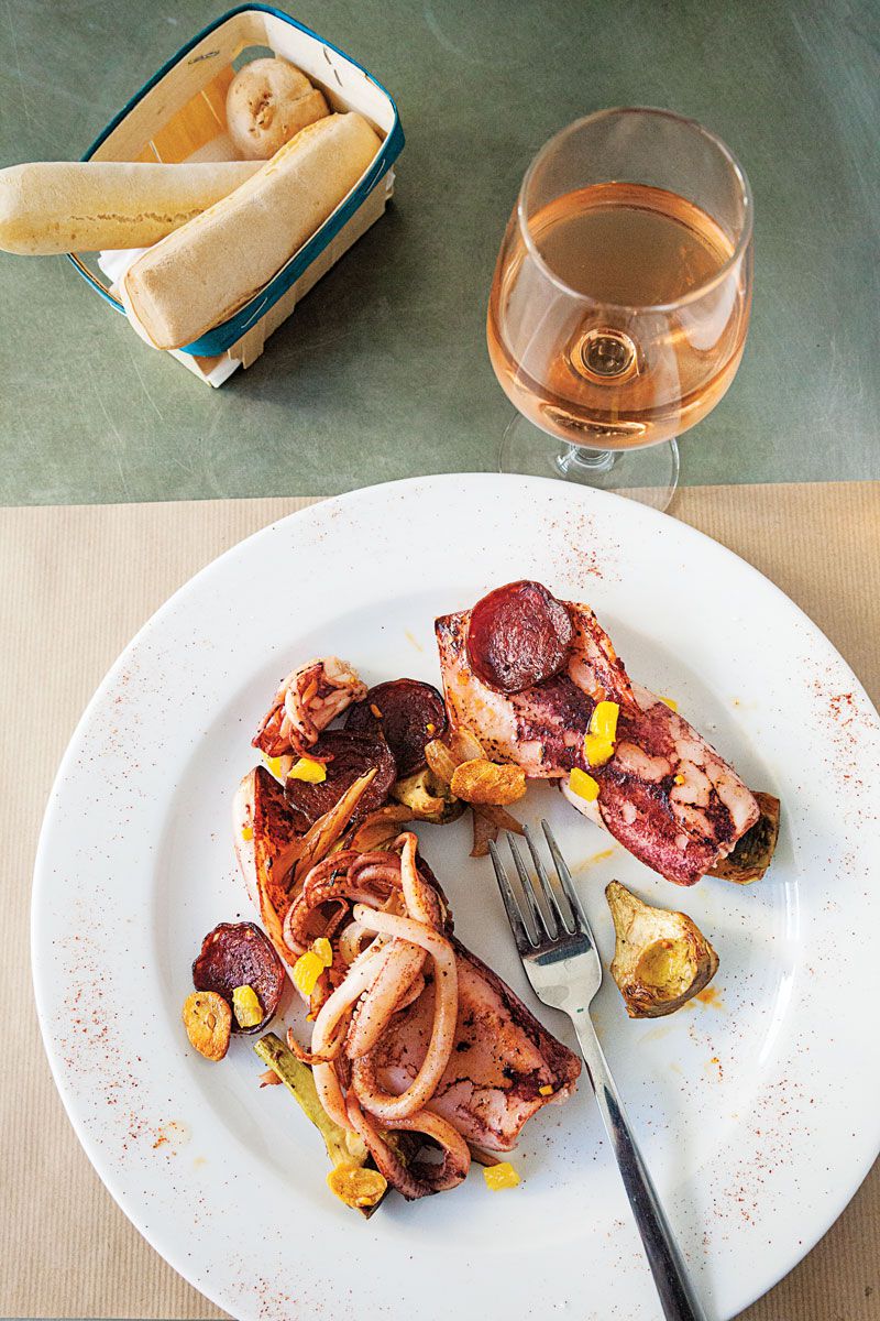 Squid and artichokes are sautéed here in the paprika-laced drippings of chorizo. Get the recipe for <a href="https://www.saveur.com/article/recipes/calamari-with-chorizo-and-artichokes/">Calamari with Chorizo and Artichokes</a>