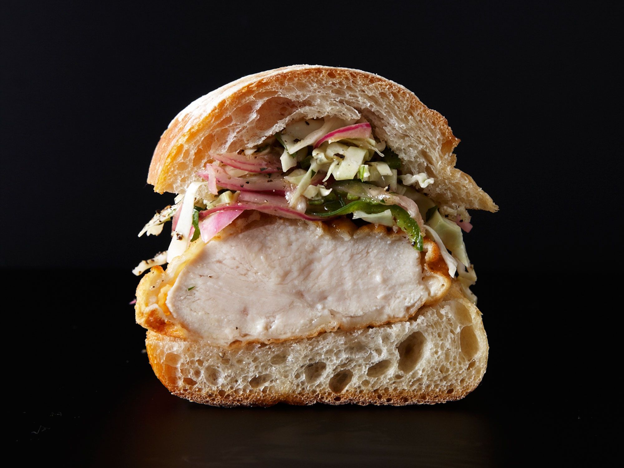 Crunchy, spicy jalapeño slaw tops this ultra-crisp fried chicken sandwich from Bakesale Betty in Oakland. Get the recipe for <a href="https://www.saveur.com/article/recipes/buttermilk-fried-chicken-sandwich/">Buttermilk Fried Chicken Sandwich with Jalapeño Slaw</a>