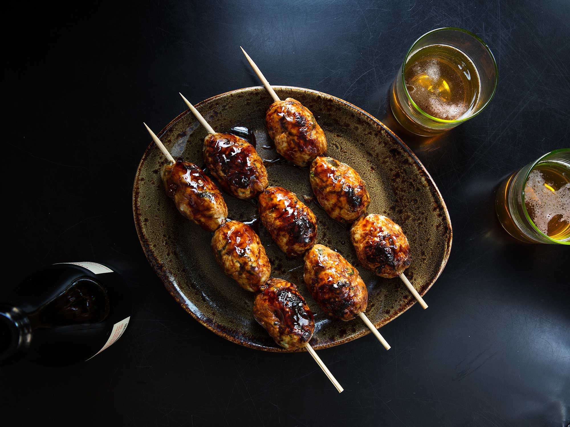 Full-flavored chicken meatballs dressed with a sweet and salty glaze. Get the recipe for <a href="https://www.saveur.com/ginger-chicken-meatball-recipe/">Japanese Grilled Chicken Meatballs (Tsukune)</a>