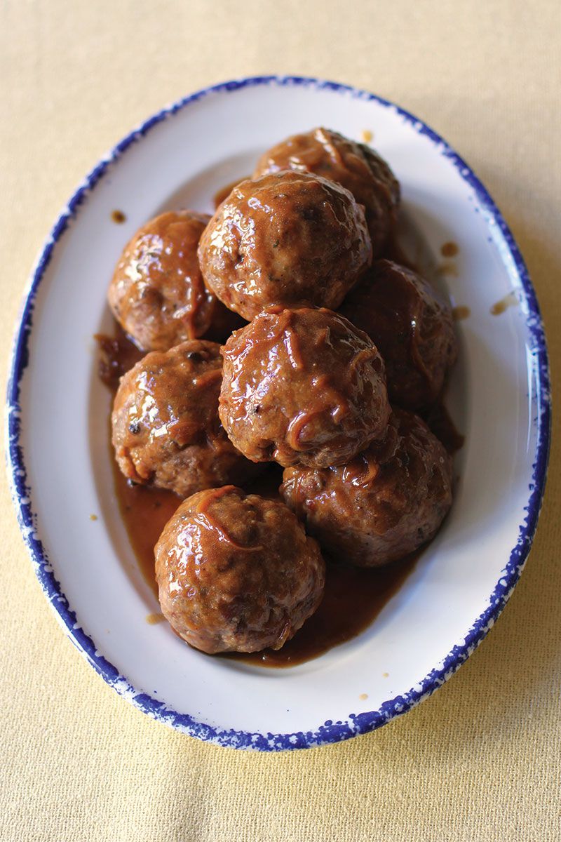 These liver-enriched pork meatballs, named for the old northern British term for uncased sausage, are delicious doused in a buttery onion gravy. Get the recipe for <a href="https://www.saveur.com/article/recipes/faggots-with-onion-gravy-welsh-style-pork-meatballs-with-onion-gravy">Welsh-Style Pork Meatballs with Onion Gravy (Faggots with Onion Gravy)</a>