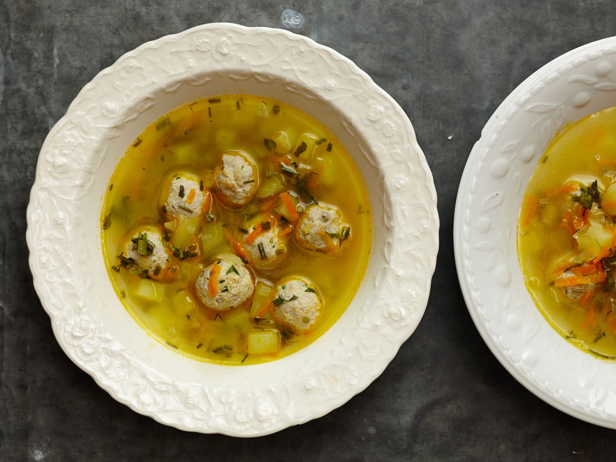 A simple onion–potato broth acts as the poaching liquid for tender turkey meatballs, the whole thing punched up with pungent, fermented dill, basil and parsley. Get the recipe for <a href="https://www.saveur.com/frikadelki-in-broth-turkey-meatball-soup-with-fermented-herbs">Frikadelki in Broth with Fermented Herbs</a>