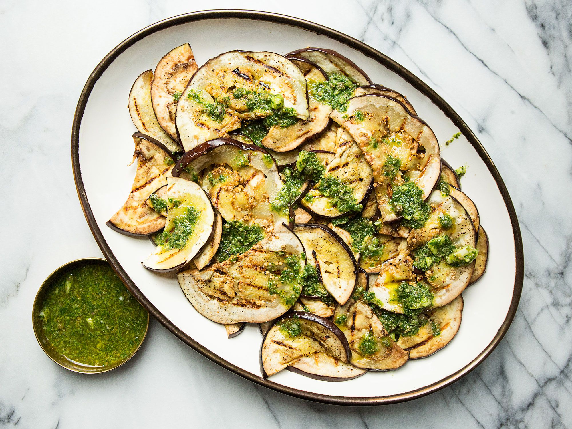 Sliced, grilled vegetables served in a simple marinade or vinaigrette are a fixture at many Tuscan meals. Get the recipe for <a href="http://www.saveur.com/article/Recipes/Grilled-Eggplant-with-Basil-Vinaigrette">Grilled Eggplant With Basil Vinaigrette</a>