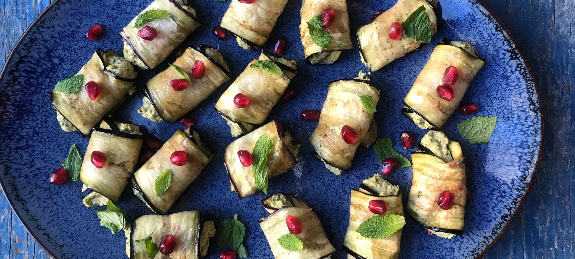 These classic Georgian eggplant rolls are filled with a mixture of garlic, herbs, and ground walnuts. The savory bites are found throughout Georgia as part of the vegetable starters for a supra, but they also make a satisfying vegetarian snack with drinks before dinner. Get the recipe for <a href="https://www.saveur.com/eggplant-rolls-recipe/">Eggplant Rolls (Nigvziani Badrijani)</a>