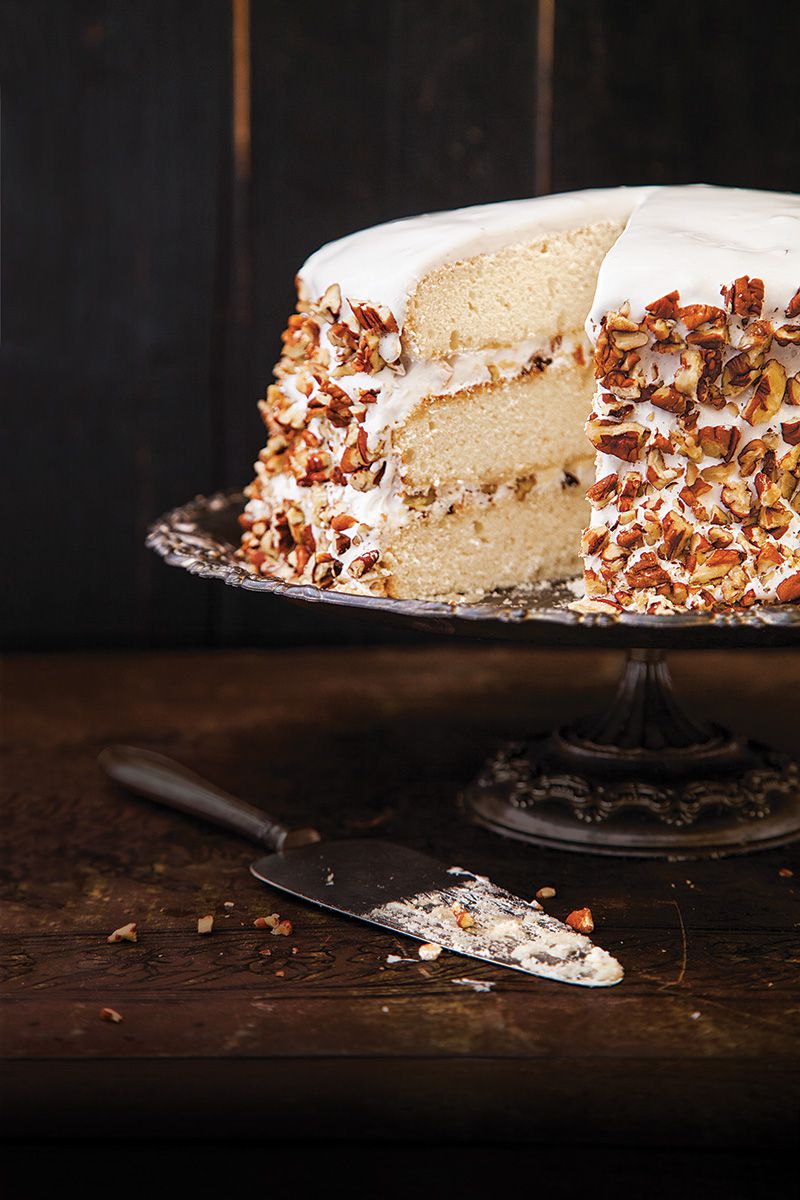 A traditional Southern confection, this regal dessert gained popularity through writer Owen Wister's 1906 romance novel, Lady Baltimore. Three dreamy white layers of cake are infused with rose water and slathered with an Italian meringue frosting studded with pecans, raisins, dried figs, and candied orange peel. Get the recipe for <a href="https://www.saveur.com/article/Recipes/Lady-Baltimore-Cake-/">Lady Baltimore Cake</a>
