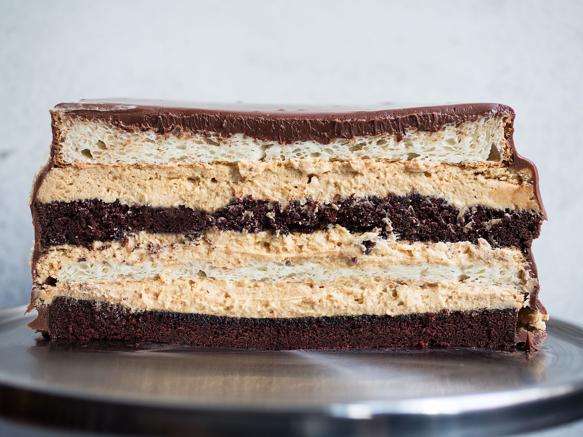 This rich, multilayered dessert of angel food and devil's food cake, peanut butter mousse, and milk chocolate ganache should be frozen before icing is added and refrigerated before it's sliced. Get the recipe for <a href="https://www.saveur.com/article/Recipes/Heaven-and-Hell-Cake/">Heaven and Hell Cake</a>