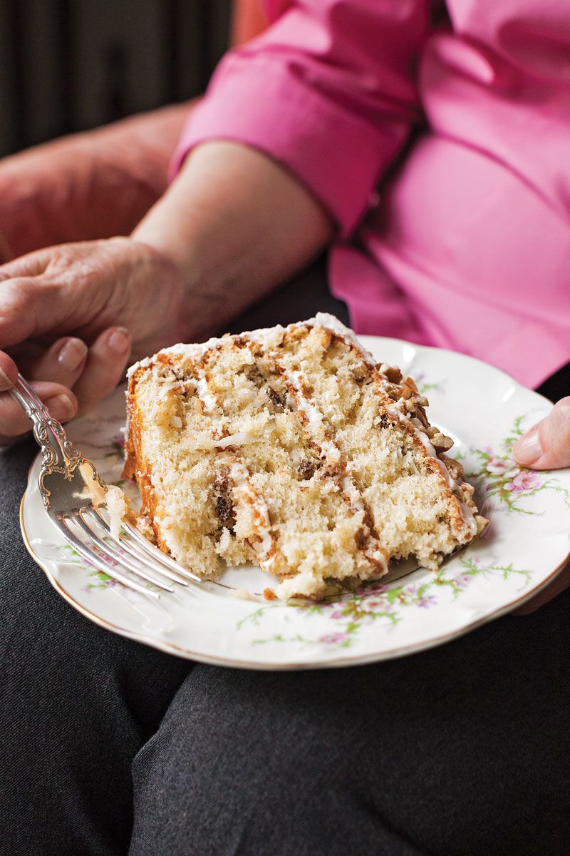 Packed with coconut and pecans and covered in cream cheese frosting, this cake is a specialty of Georgia home cook Cile Ellis. Get the recipe for <a href="https://www.saveur.com/article/recipes/pecan-cream-cake/">Pecan Cream Cake</a>