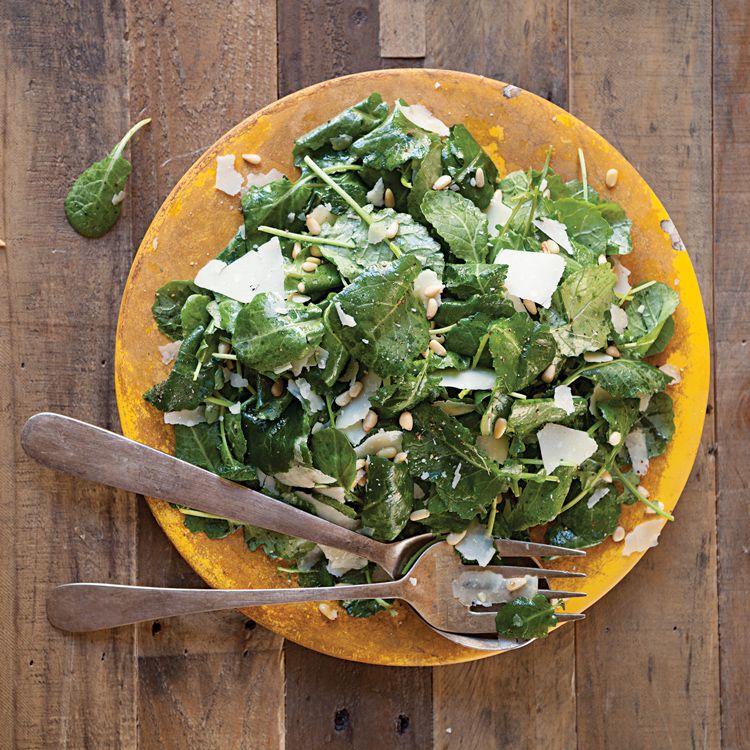 This quick, zesty kale salad from Florida chef Jeffery Jew gets a decadent touch from rich pine nuts and ribbons of parmesan cheese. Get the recipe for <a href="https://www.saveur.com/article/recipes/baby-kale-salad-with-pine-nuts-parmesan-and-lemon-vinaigrette/">Baby Kale Salad with Pine Nuts, Parmesan, and Lemon Vinaigrette</a>
