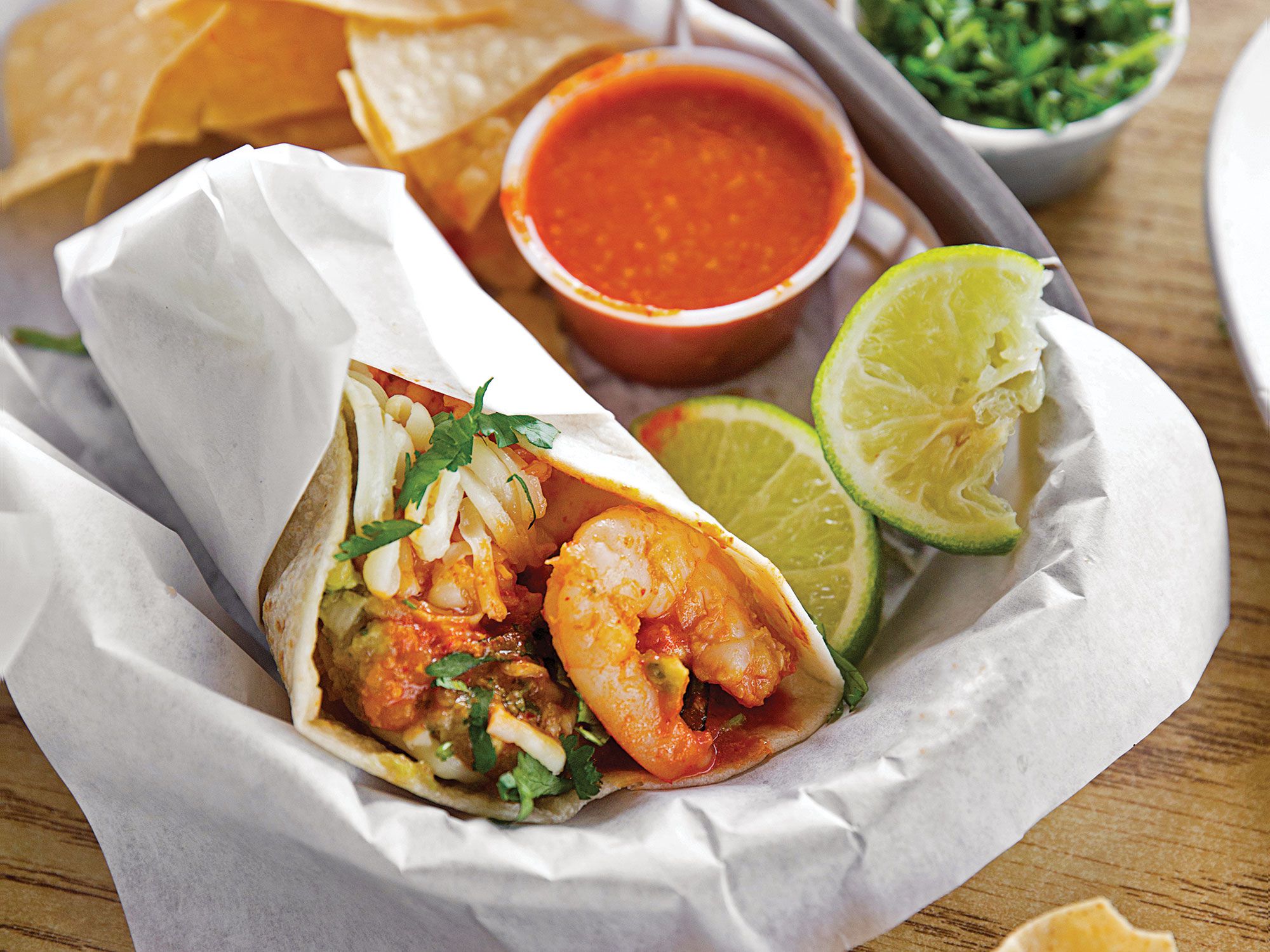 Every element of this taco—inspired by those at Don Pepe Taqueria in Fresno—is amped up, from the red rice simmered in a blend of chicken stock and puréed tomatoes to the quick-marinated shrimp. Use large flour tortillas as tacos or wrap them into a burrito. Get the recipe for <a href="https://www.saveur.com/article/recipes/shrimp-tacos/">Shrimp Tacos</a>