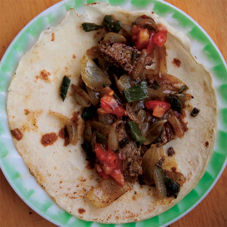 The beef cut of choice for California barbecue and grilling, tri-tip steak (also called Newport, Santa Maria, or triangle steak) comes from the lean bottom sirloin. Here it's sliced and seasoned with rosemary, chiles, garlic, and cumin in a tender filling for tacos. Get the recipe for <a href="https://www.saveur.com/article/Recipes/Grilled-Tri-Tip-Tacos/">Grilled Tri-Tip Tacos</a>