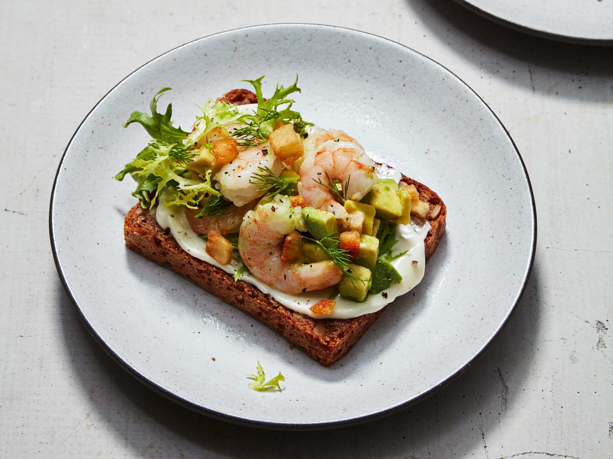 Take avocado toast to a new level with this tasty Danish open-face sandwich. Get the recipe for <a href="https://www.saveur.com/shrimp-avocado-potato-smorrebrod-recipe/">Shrimp, Avocado, and Crispy Potato Smorrebrod</a>