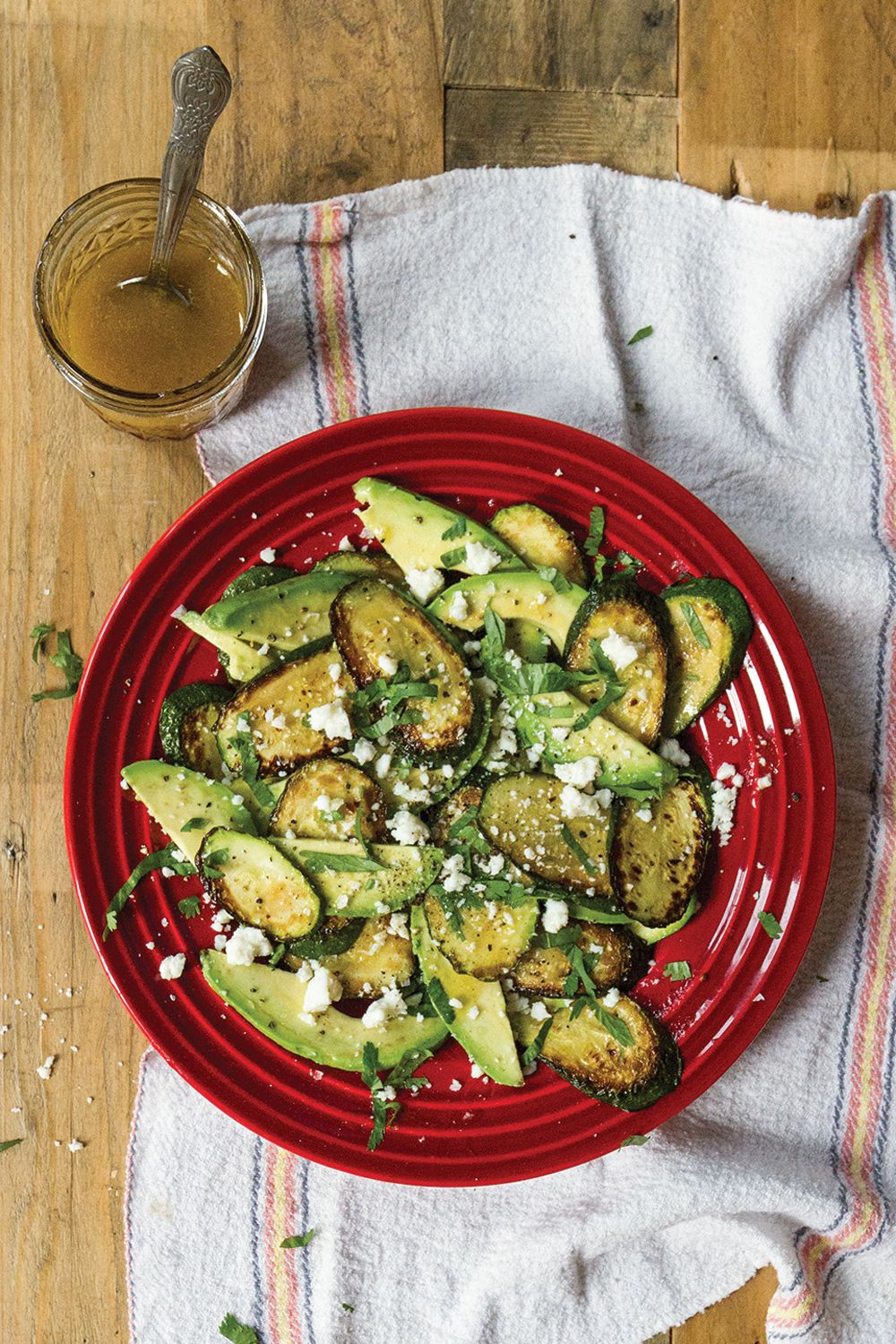 This simple Mexican salad consists of grilled zucchini, avocado, and salty, crumbled añejo cheese. Get the recipe for <a href="https://www.saveur.com/article/recipes/frida-kahlos-zucchini-salad-ensalada-de-calabacin/">Frida Kahlo's Zucchini Salad (Ensalada de Calabacín)</a>