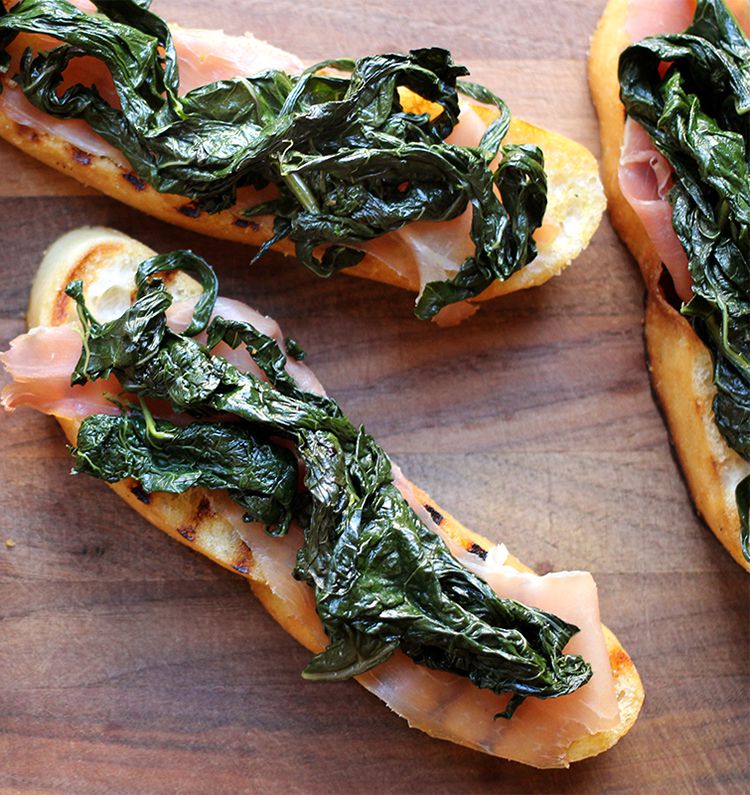 Cavolo nero, also known as Tuscan kale, Lacinato kale, or Dinosaur kale, balances thinly sliced, salty prosciutto over toast. Get the recipe for <a href="https://www.saveur.com/article/Recipes/Cavolo-Nero-and-Prosciutto-Bruschetta">Cavolo Nero and Prosciutto Bruschetta</a>