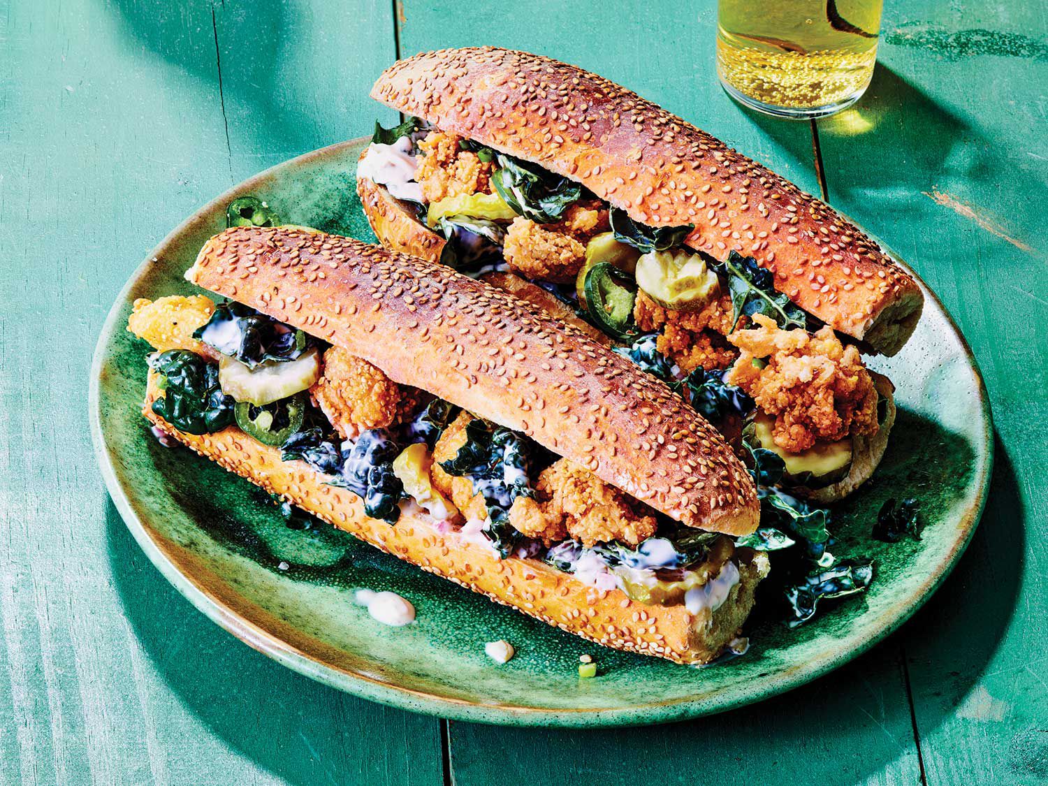 Crispy and crowd-pleasing, these sandwiches are a gateway preparation for oyster neophytes. Feel free to use pre-shucked oysters to save time. Get the recipe for <a href="https://www.saveur.com/fried-oyster-po-boys-recipe">Fried Oyster Po'Boys with Kale and Tartar Sauce</a>