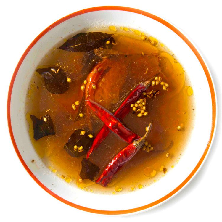 "Pepper is for colds and coughs, and turmeric heals wounds," says cookbook author Viji Varadarajan. In his native South India, <em>milagu rasam</em>, a broth made with those key ingredients, also includes a dose of tamarind, which is believed to help heal sore throats. Get the recipe for <a href="http://www.saveur.com/article/Recipes/Milagu-Rasam">Spicy Tomato and Tamarind Soup (Milagu Rasam)</a>