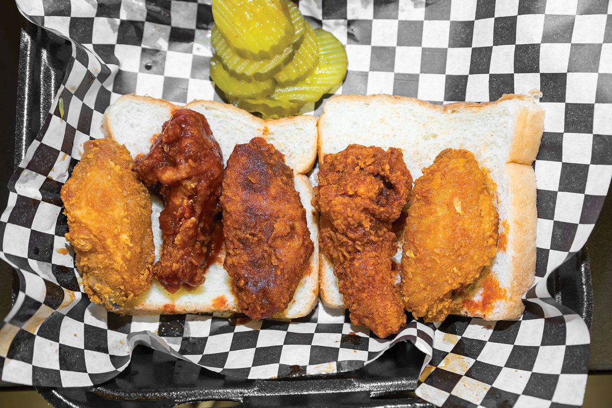 The secret to Nashville's famous hot chicken is in the layering: The bird is marinated in a spicy buttermilk brine, then dredged with more flour and spice, double-fried, and finally slathered with a fiery butter paste to create a crunchy, peppery coating. One bite into its burnished orange crust reveals first a tangy crunch, and then a deeper, complex spice that leaves a lingering fire behind. Adjust the heat by adding as much—or as little—cayenne as you like. Get the recipe for <a href="https://www.saveur.com/article/recipes/nashville-hot-chicken/">Nashville Hot Chicken</a>