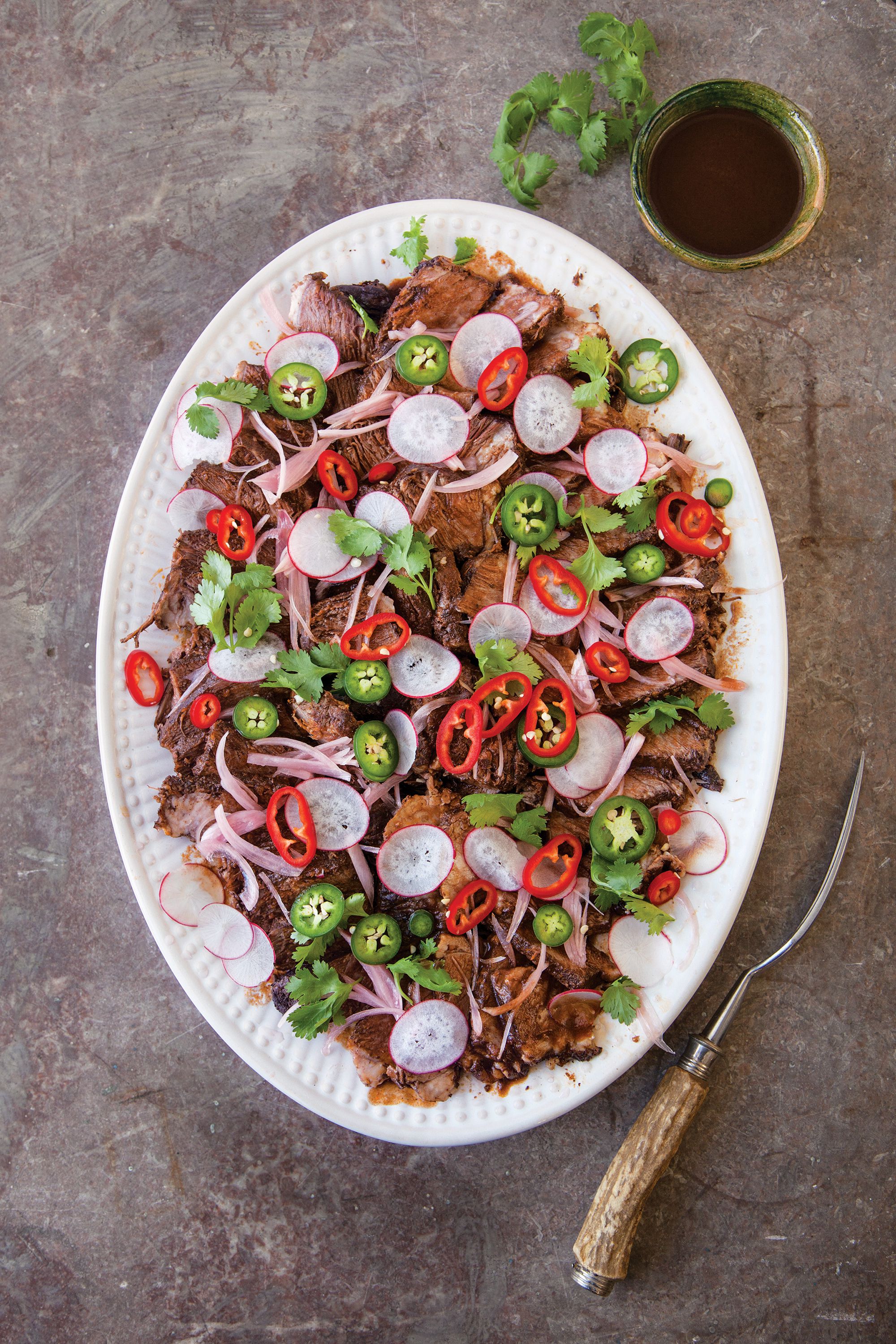 The small flap of meat between the chuck and the rib eye in Wagyu is called the <em>zabuton</em>, meaning "cushion" in Japanese. Nicely marbled with intramuscular fat, the little-known cut—sometimes dubbed a Denver steak—is buttery and rich. Get the recipe for <a href="https://www.saveur.com/article/recipes/braised-zabuton-beef-with-coffee-beans/">Braised Zabuton with Coffee Beans</a>