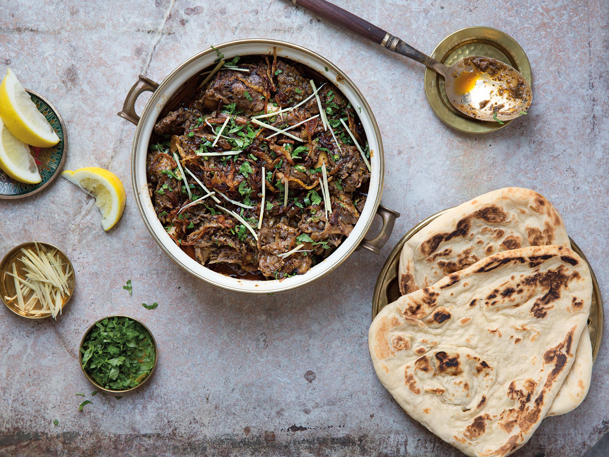 A rich, spicy stew topped with bright cilantro leaves, a squeeze of citrus, and thin-sliced hot chiles, nihari is the ultimate comfort food. Get the recipe for <a href="http://www.saveur.com/article/recipes/pakistani-slow-cooked-lamb-stew-dumbay-ki-nihari">Pakistani Slow-Cooked Lamb Stew (Dumbay Ki Nihari)</a>