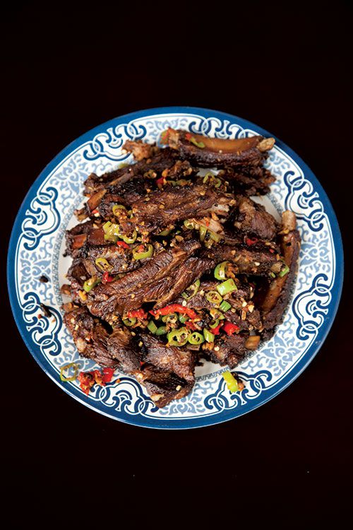 These lavishly spiced ribs have some serious heat and require an overnight marinade, so be sure to plan accordingly. Get the recipe for <a href="https://www.saveur.com/article/Recipes/Triple-Cooked-Spareribs/">Lu Rou (Triple-Cooked Spareribs with Chiles)</a>