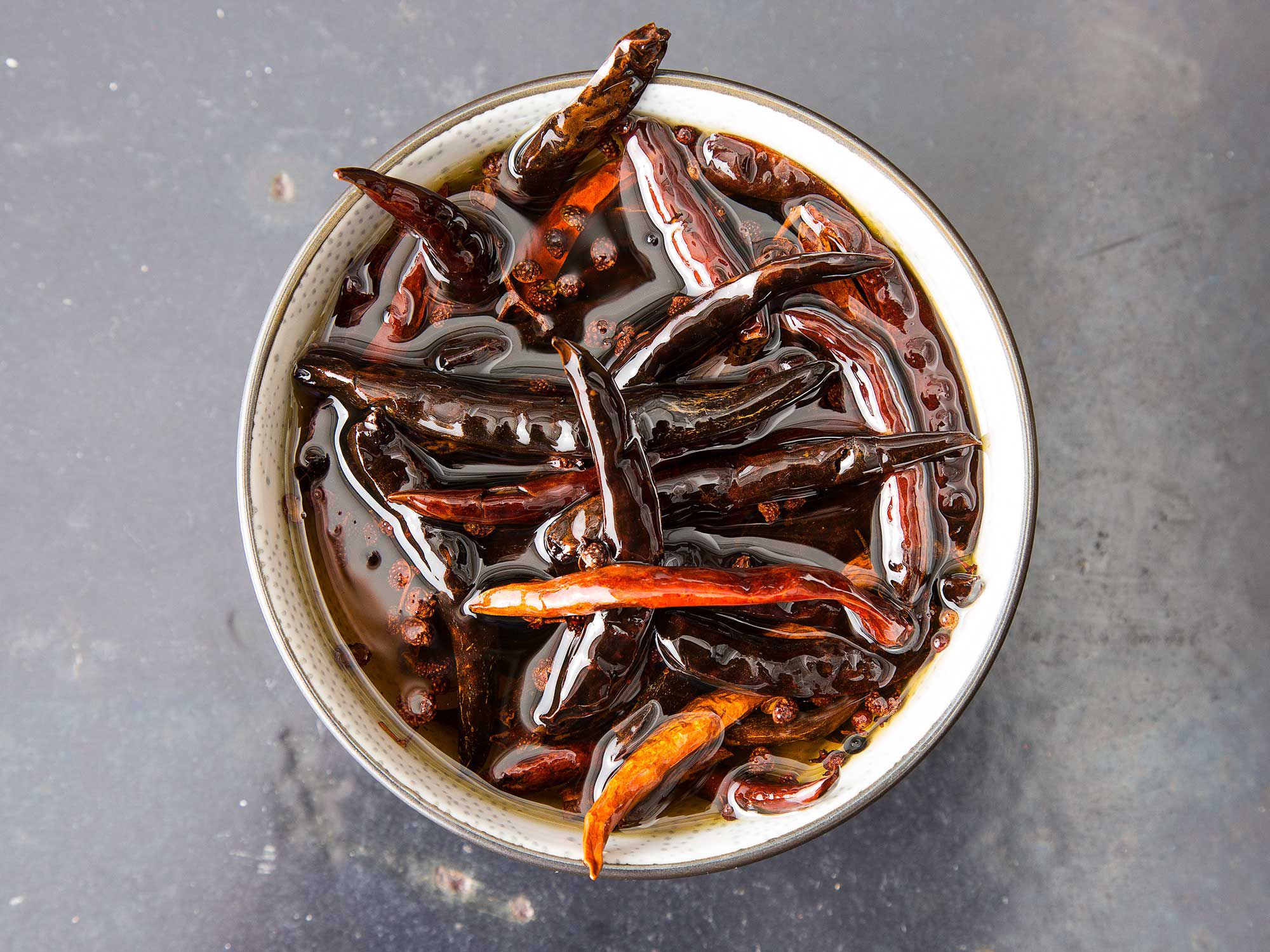 A toasty, subtly fiery chile oil to drizzle over soup ot dip with dumplings. It's worth making a large batch; the oil will keep at room temperature for a year. Get the recipe for <a href="https://www.saveur.com/sichuan-chile-oil-recipe/">Sichuan Chile Oil</a>