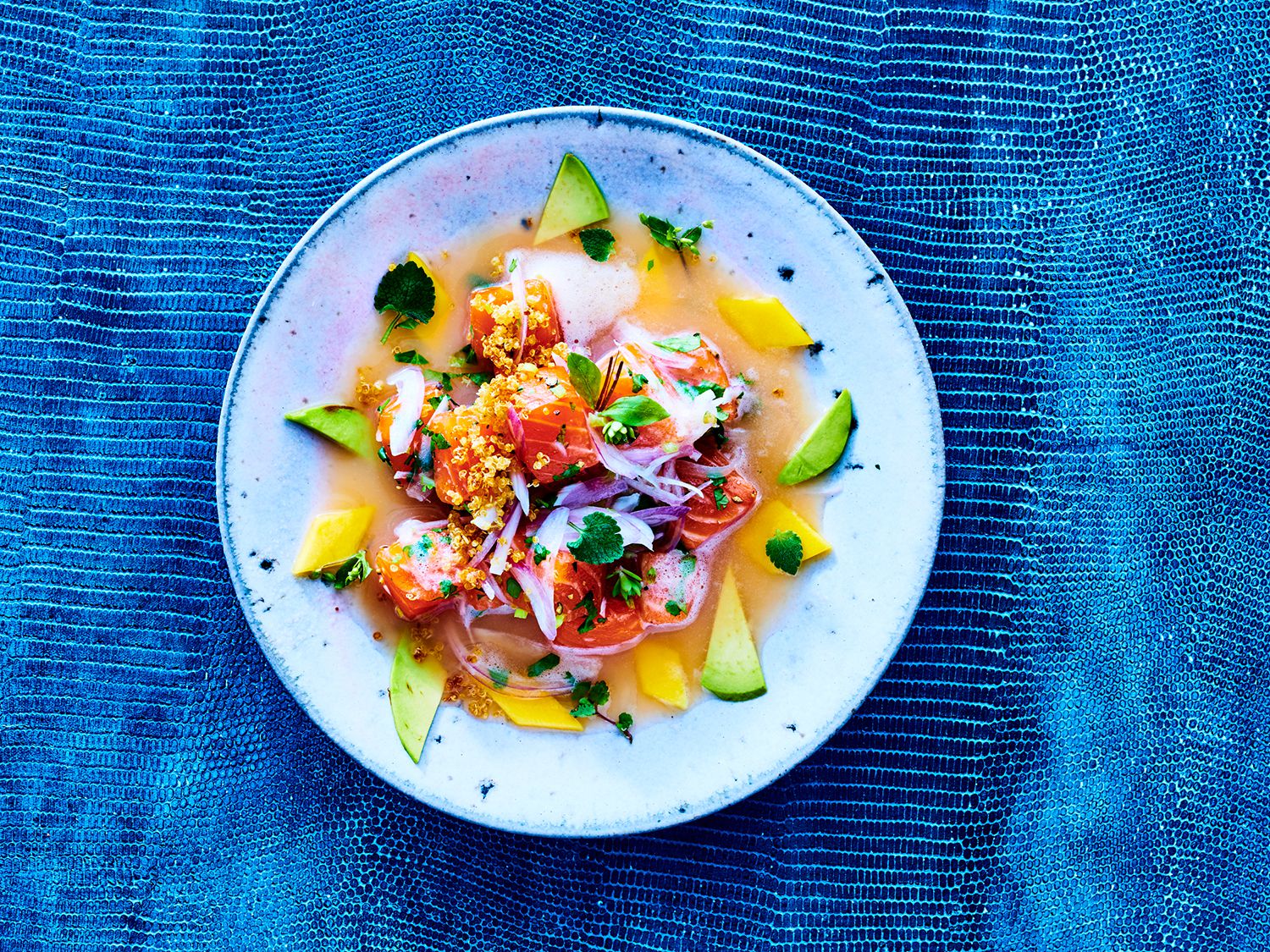 This ceviche dish is inspired by "palta," as the combination of salmon and avocado is known in Lima, where it's a popular sushi roll order at Japanese restaurants. Get the recipe for <a href="https://www.saveur.com/salmon-ceviche-with-avocado-and-mango/">Salmon Ceviche with Avocado and Mango</a>